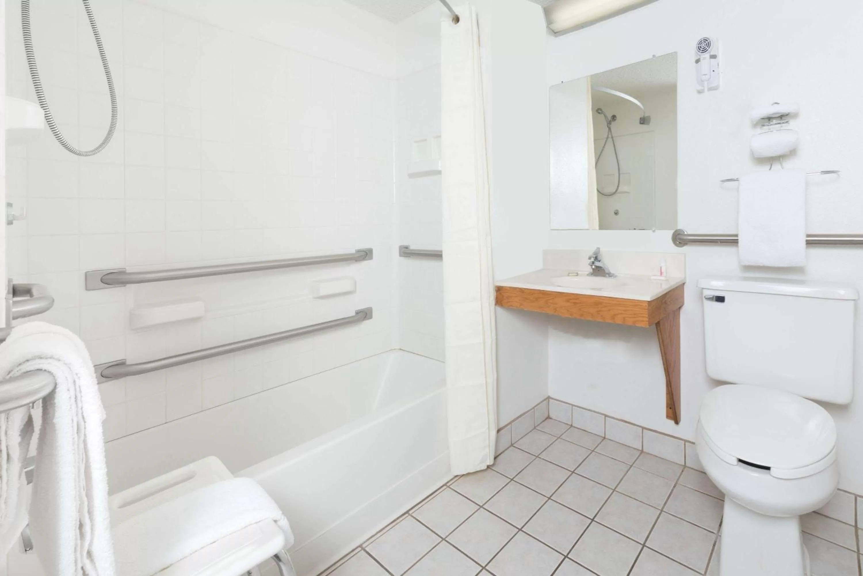 Bathroom in Super 8 by Wyndham Front Royal Near Shenandoah National Park