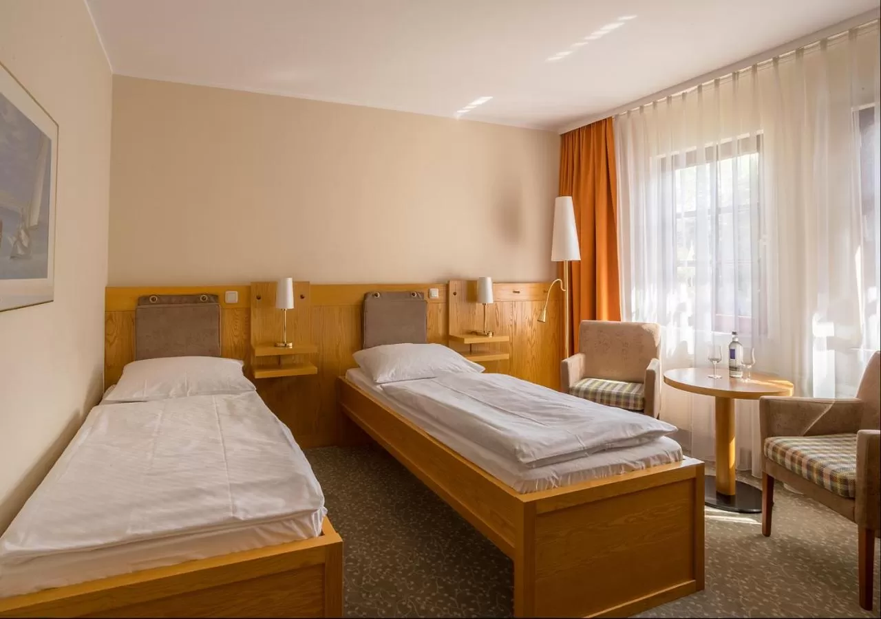 Photo of the whole room, Bed in Ringhotel Warnemünder Hof