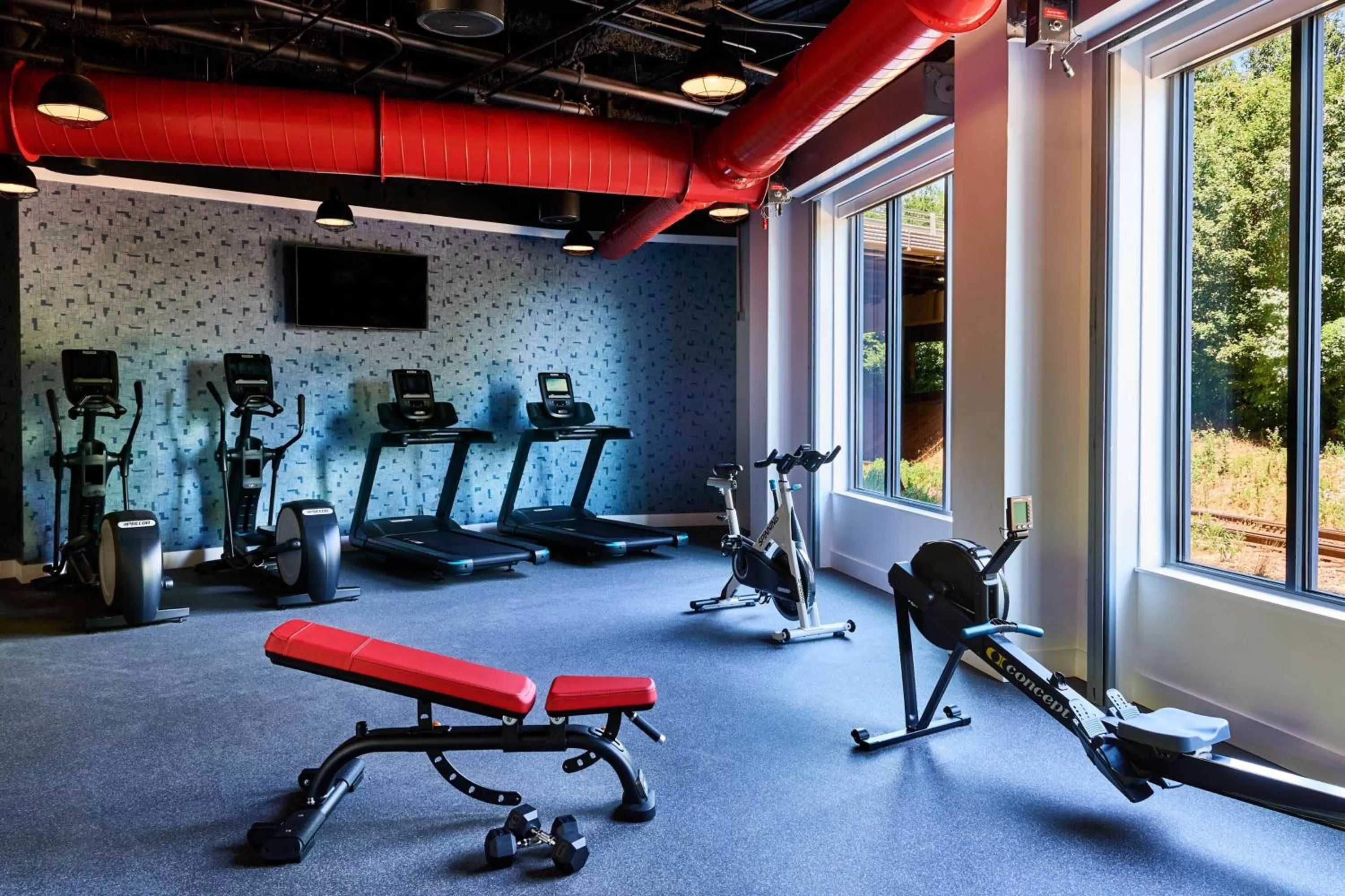 Fitness centre/facilities in The Casso, Raleigh, a Tribute Portfolio Hotel