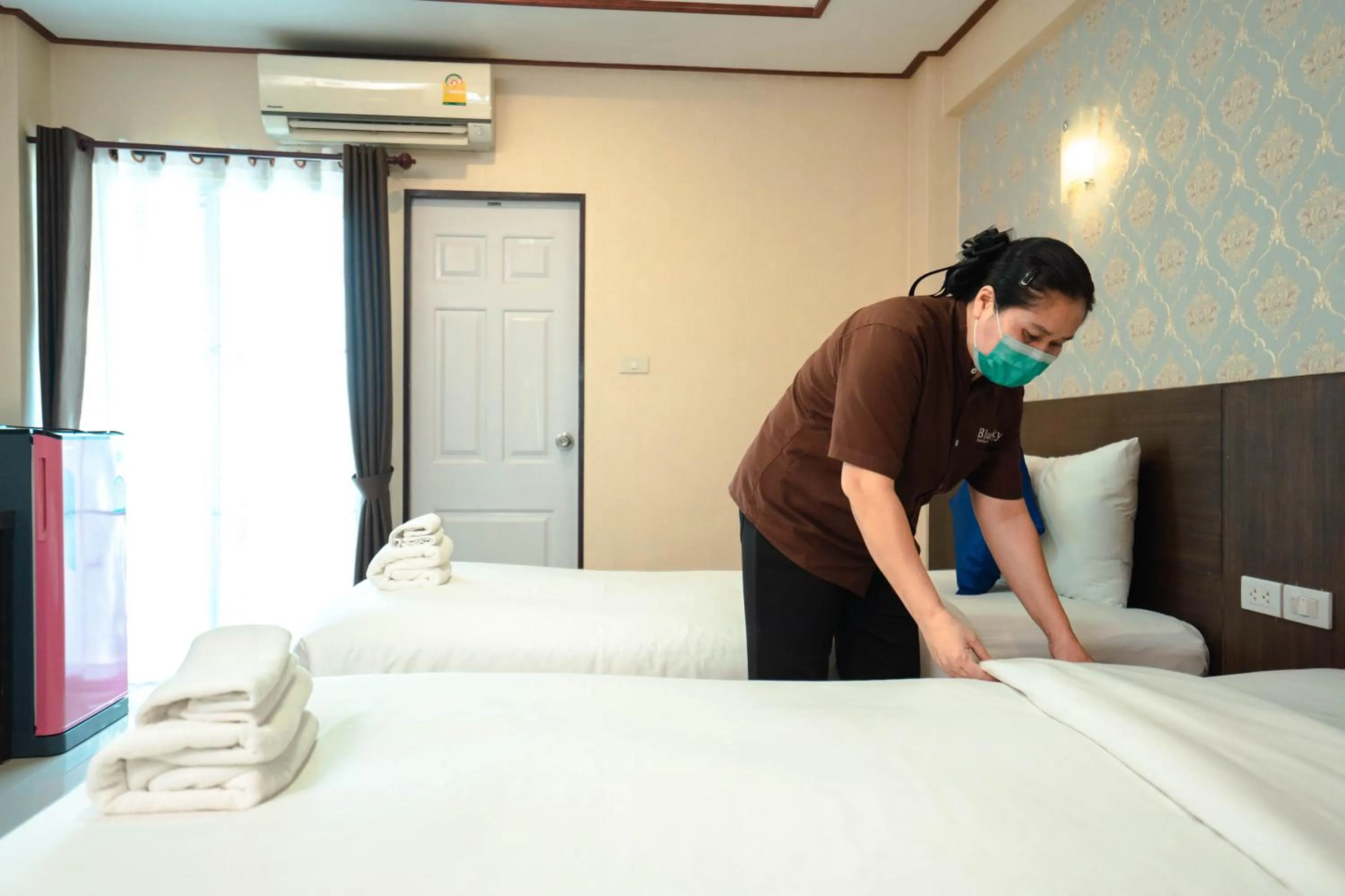 Staff, Bed in Blue Sky Residence Airport