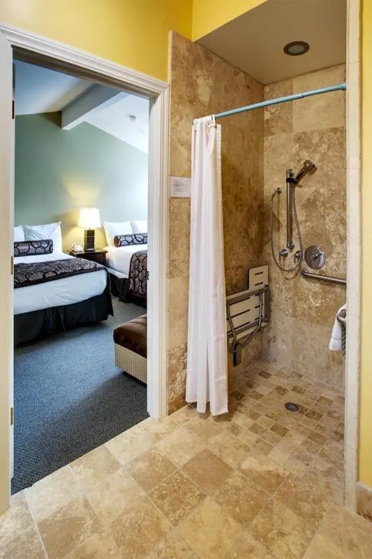 Shower, Bed in Monterey Peninsula Inn