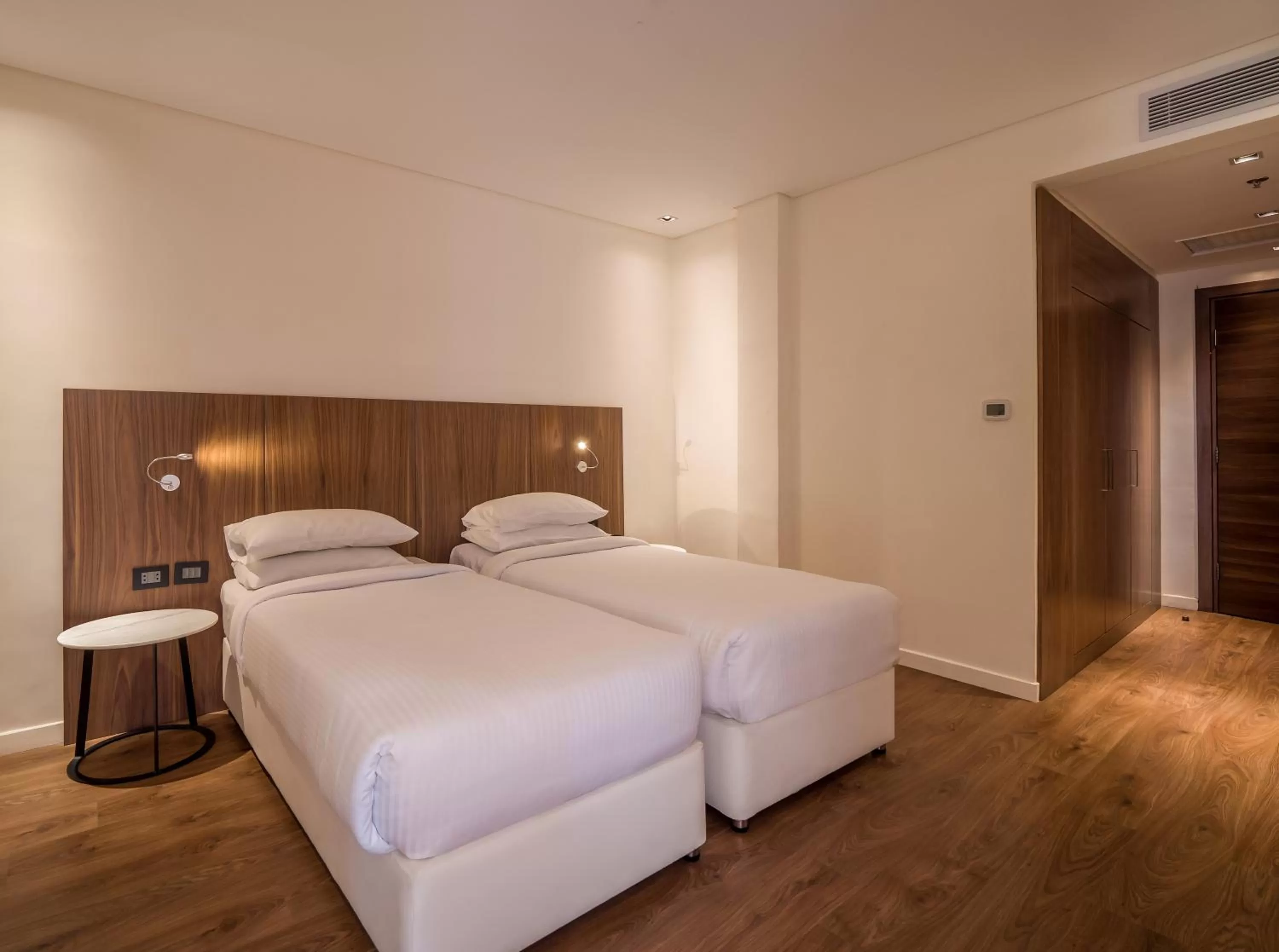 Bed in The President Hotel Cairo