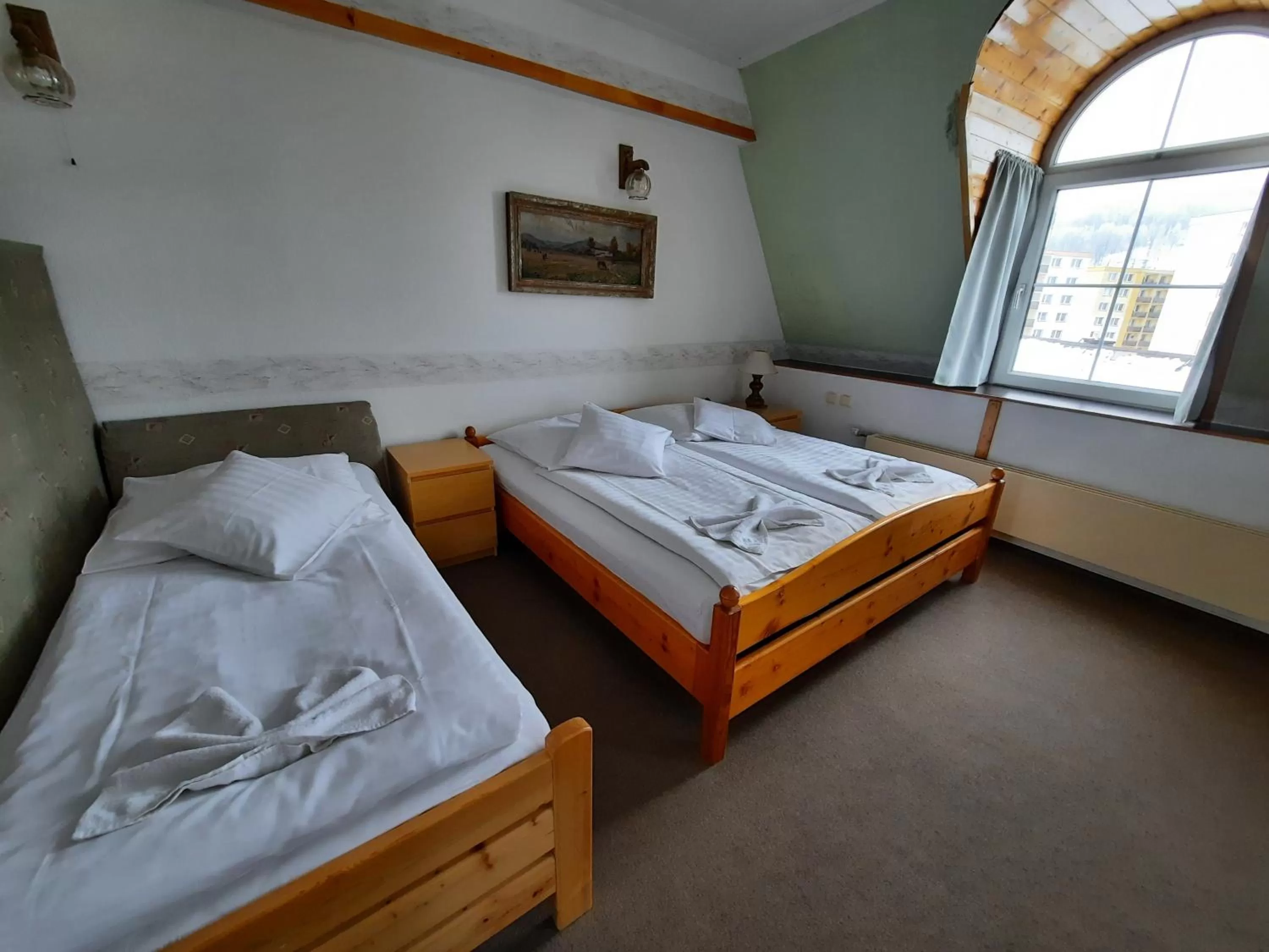 Bed in Hotel Koruna