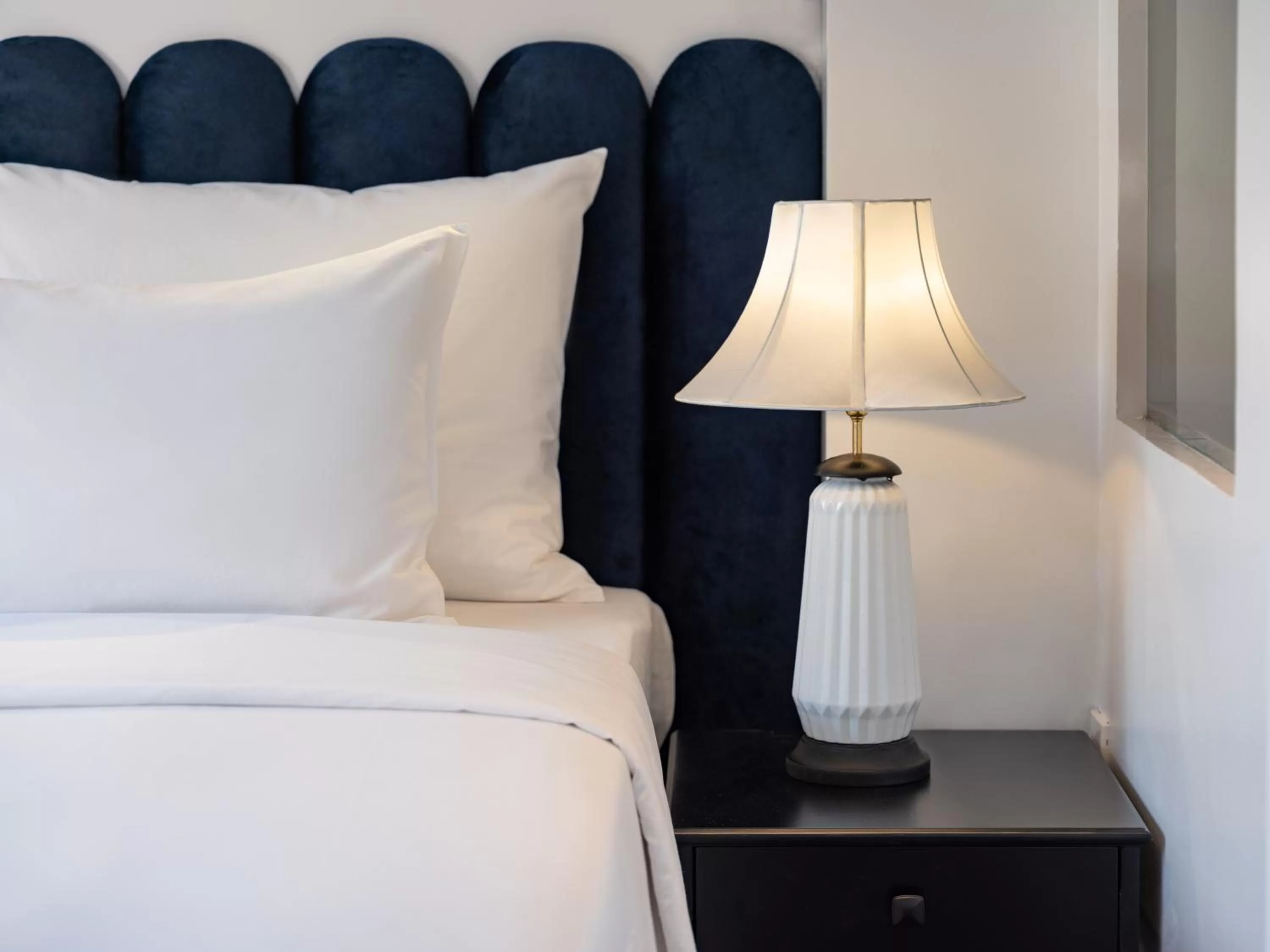 Bed in The Flower Boutique Hotel & Travel