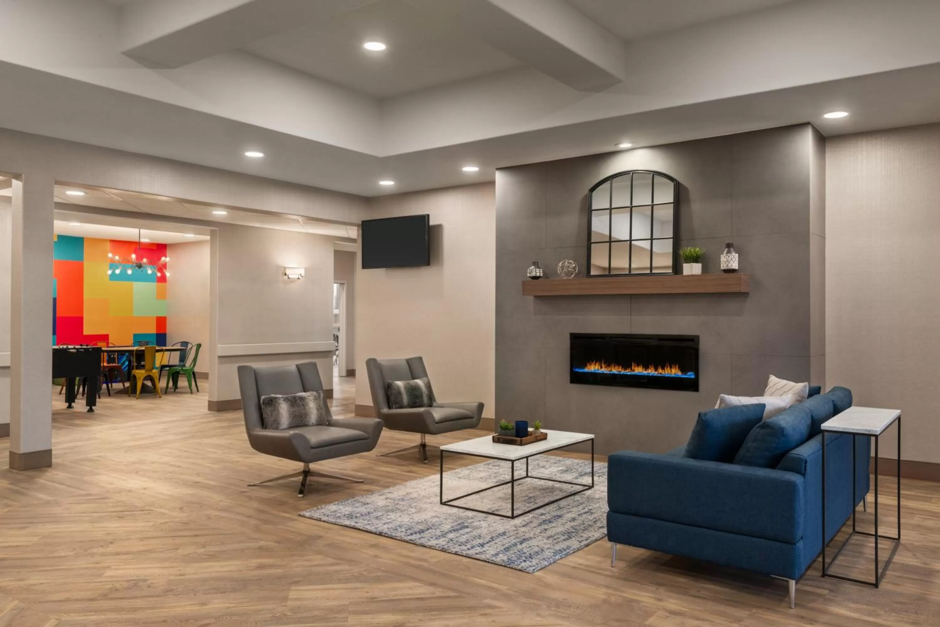 Lobby or reception in Ramada by Wyndham Airdrie Hotel & Suites