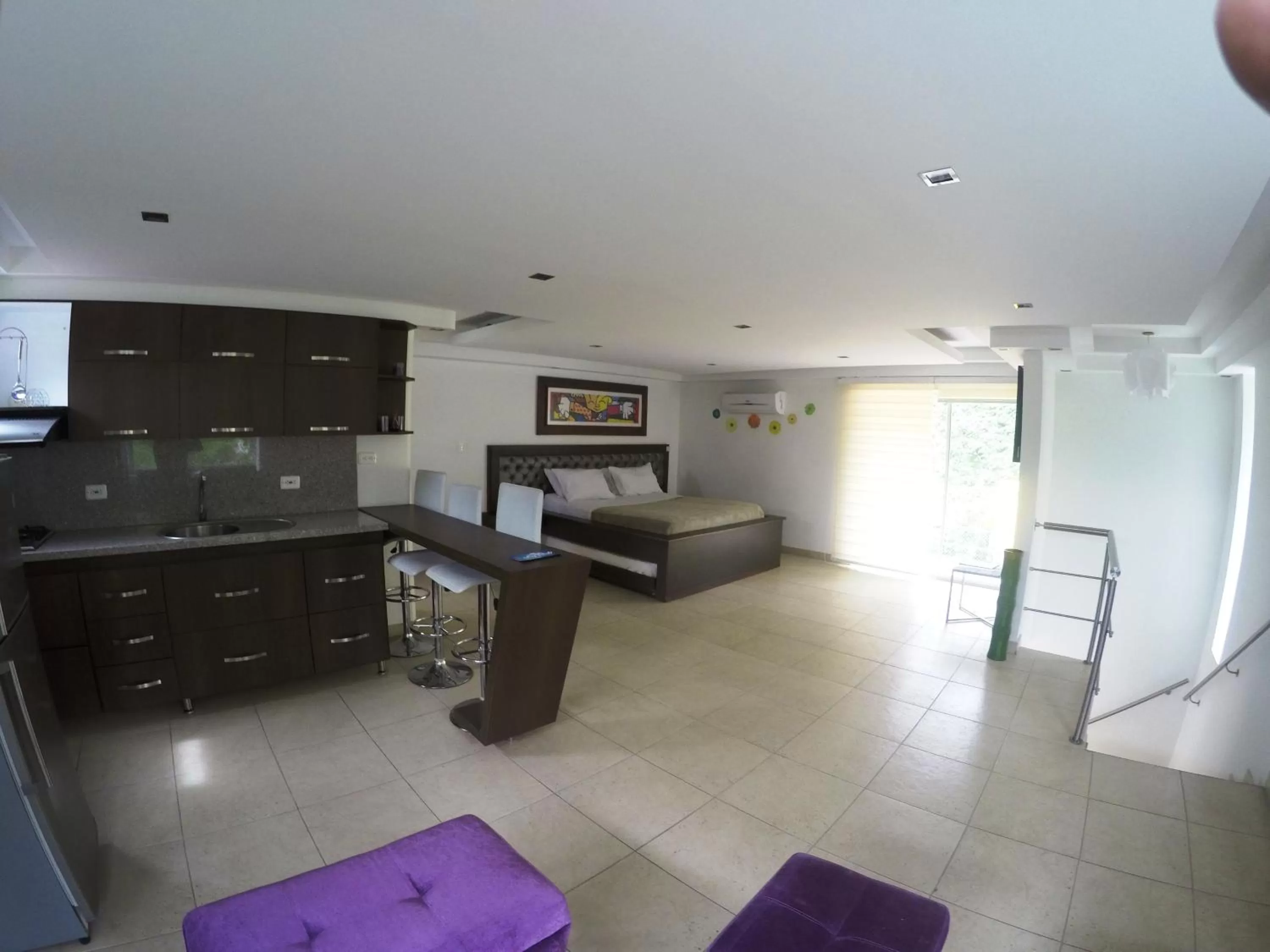 Bed, Kitchen/Kitchenette in Sky Club Eco Hotel