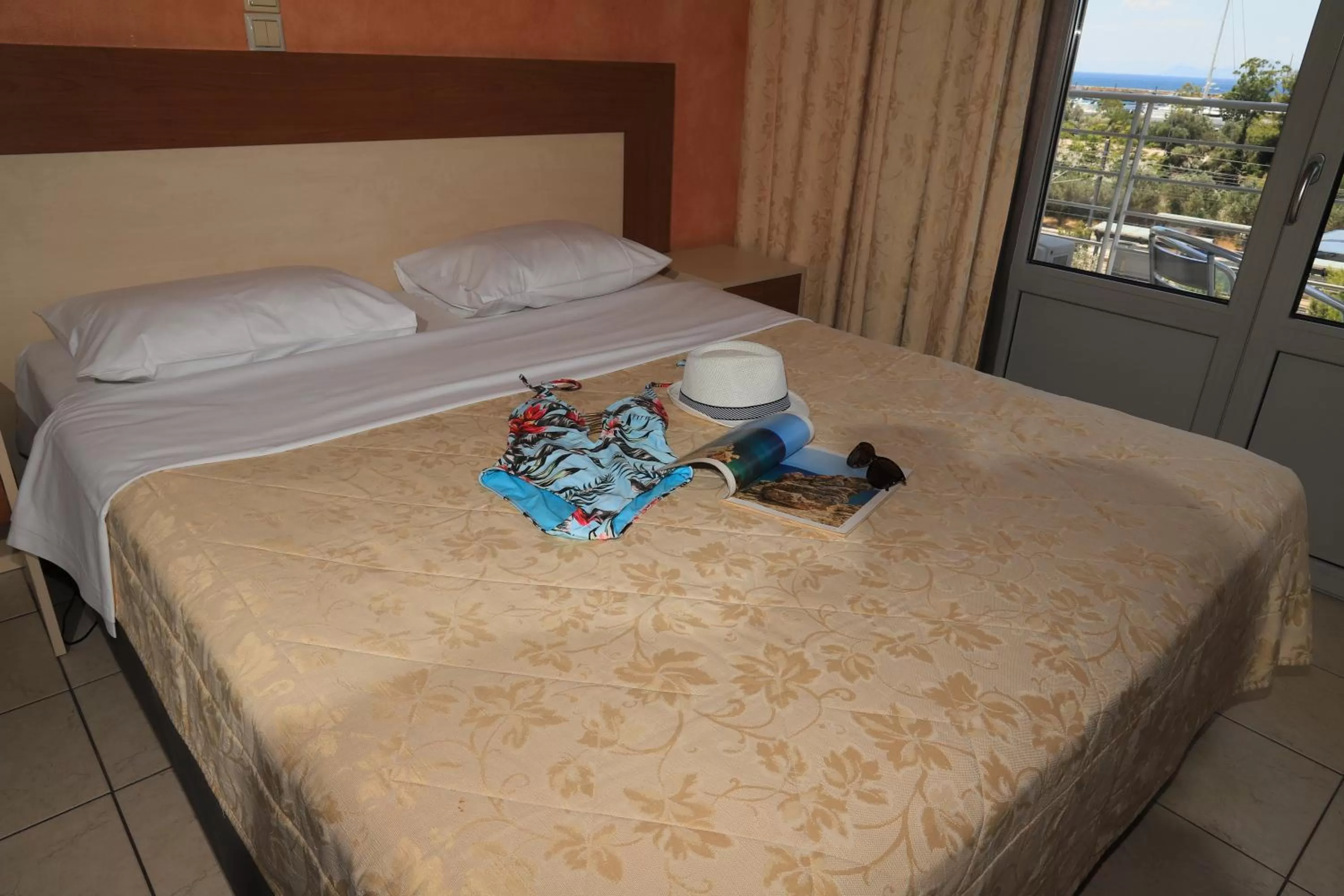 Bed in IKAROS Hotel ELLINIKO