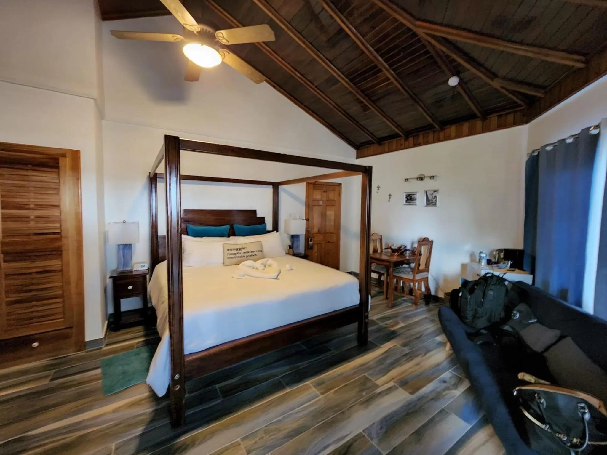 Seating area, Bed in Blue Skies Beach Resort