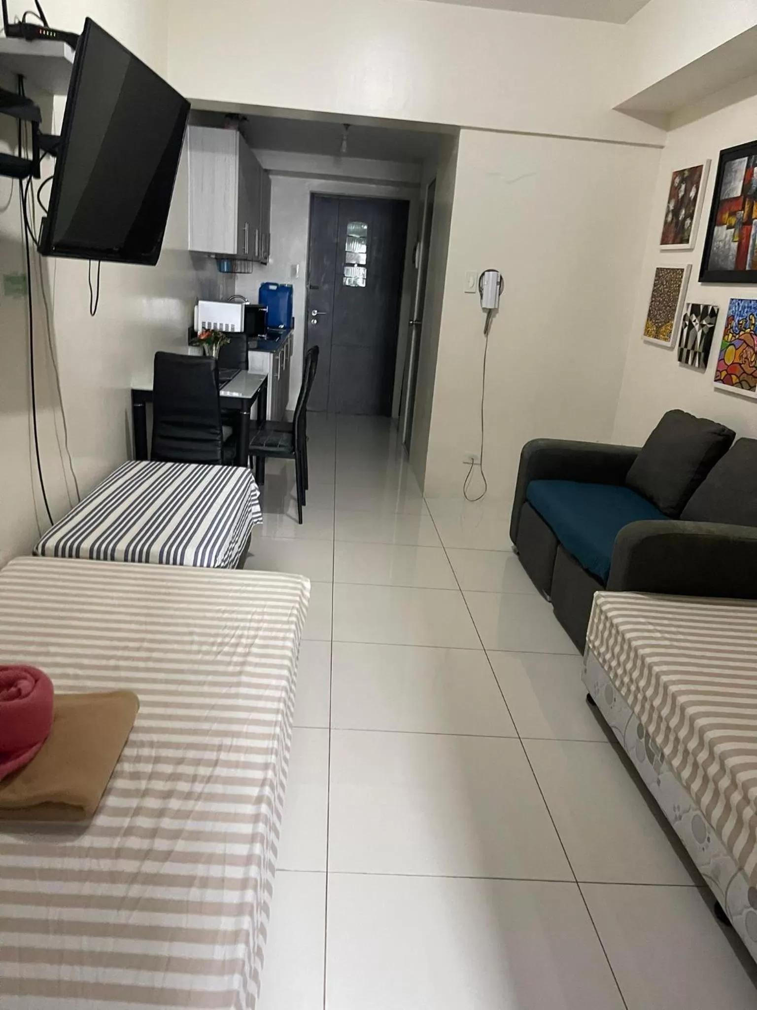 TV and multimedia, Seating Area in Green Residences Staycation by PBYY