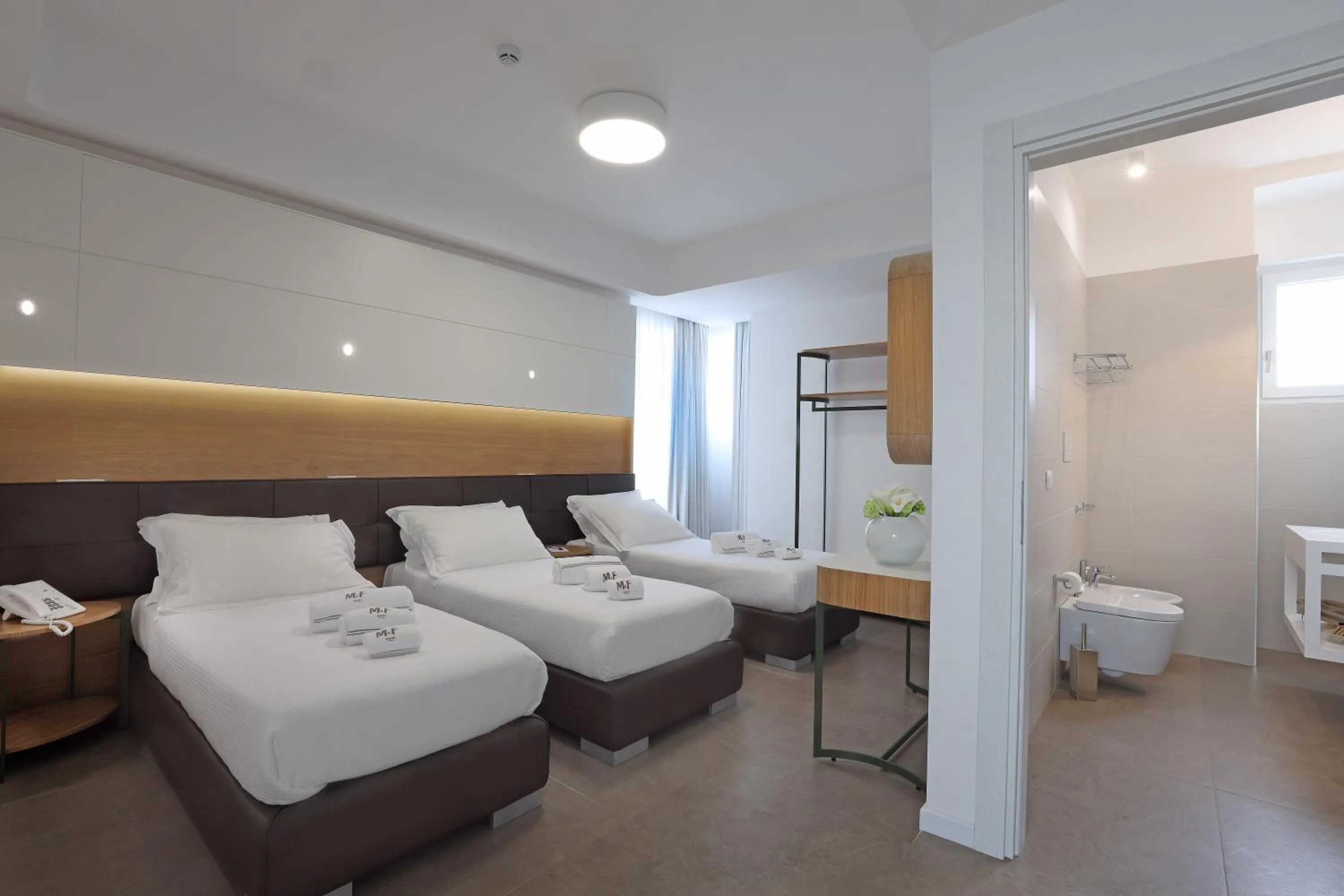 Photo of the whole room, Bed in M&F Hotel