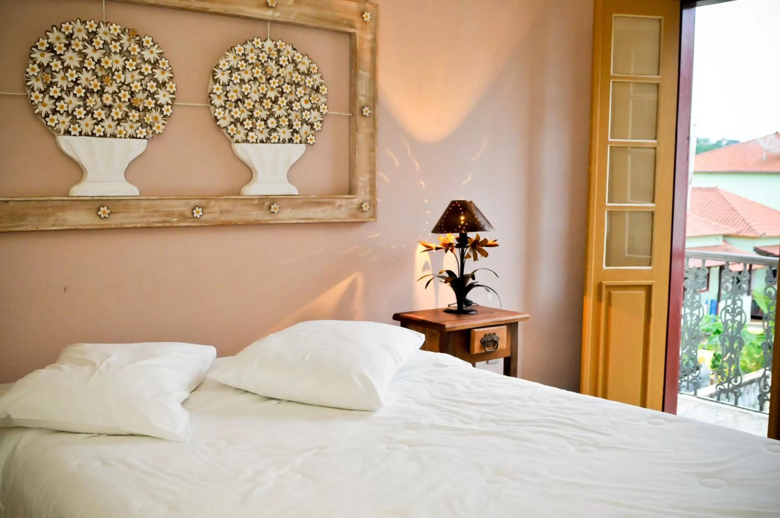 Decorative detail, Bed in Pousada Neuza Barbosa