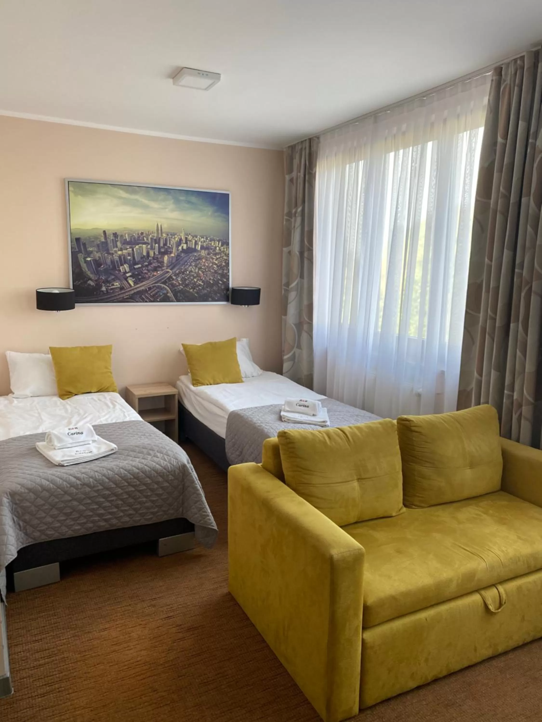 Photo of the whole room, Bed in Carina Hotel