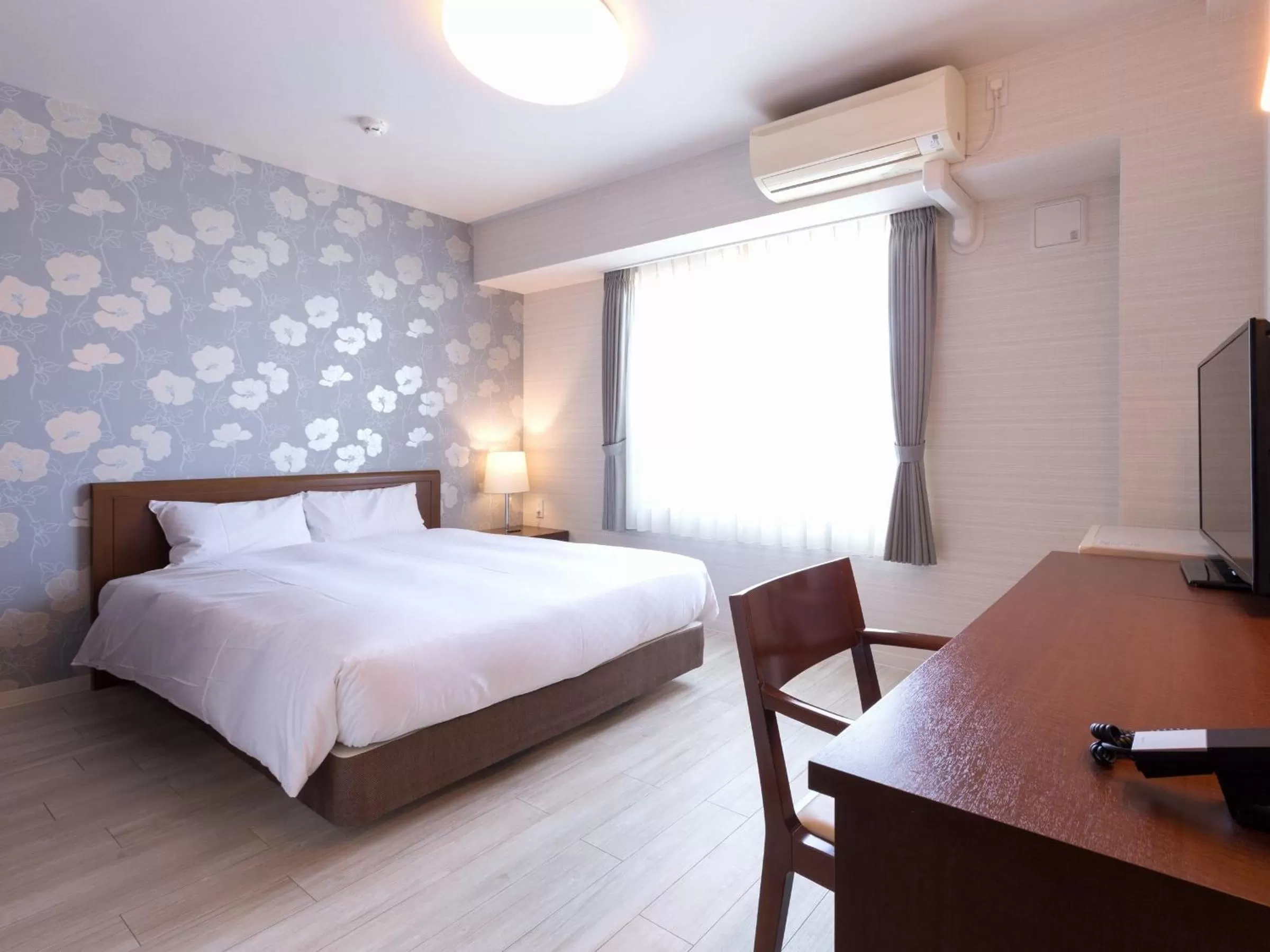 Bed in Hotel Hakata Place