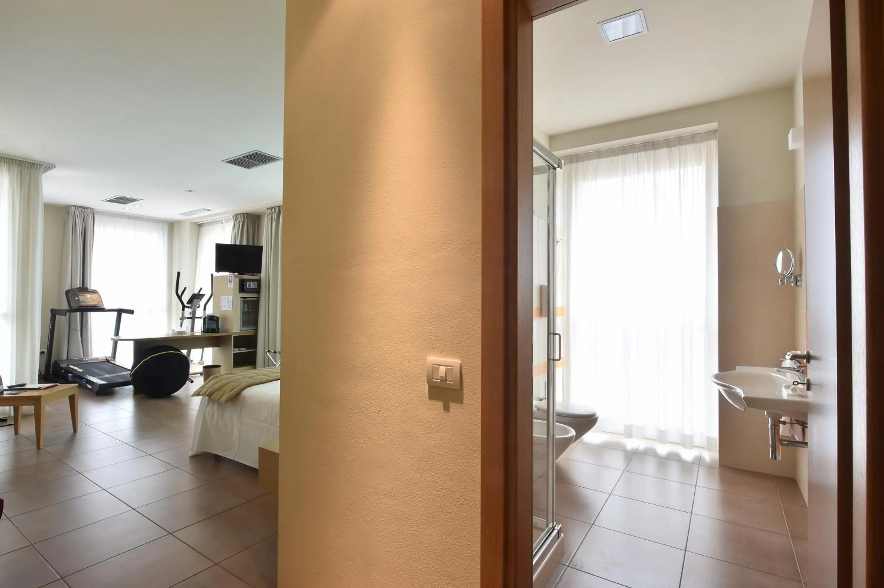 Bedroom in Tatì Hotel