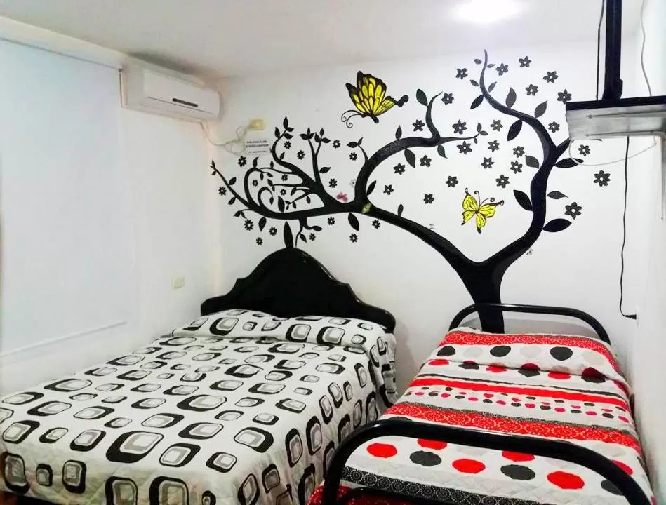 Photo of the whole room, Bed in Casa Turística Realismo Mágico