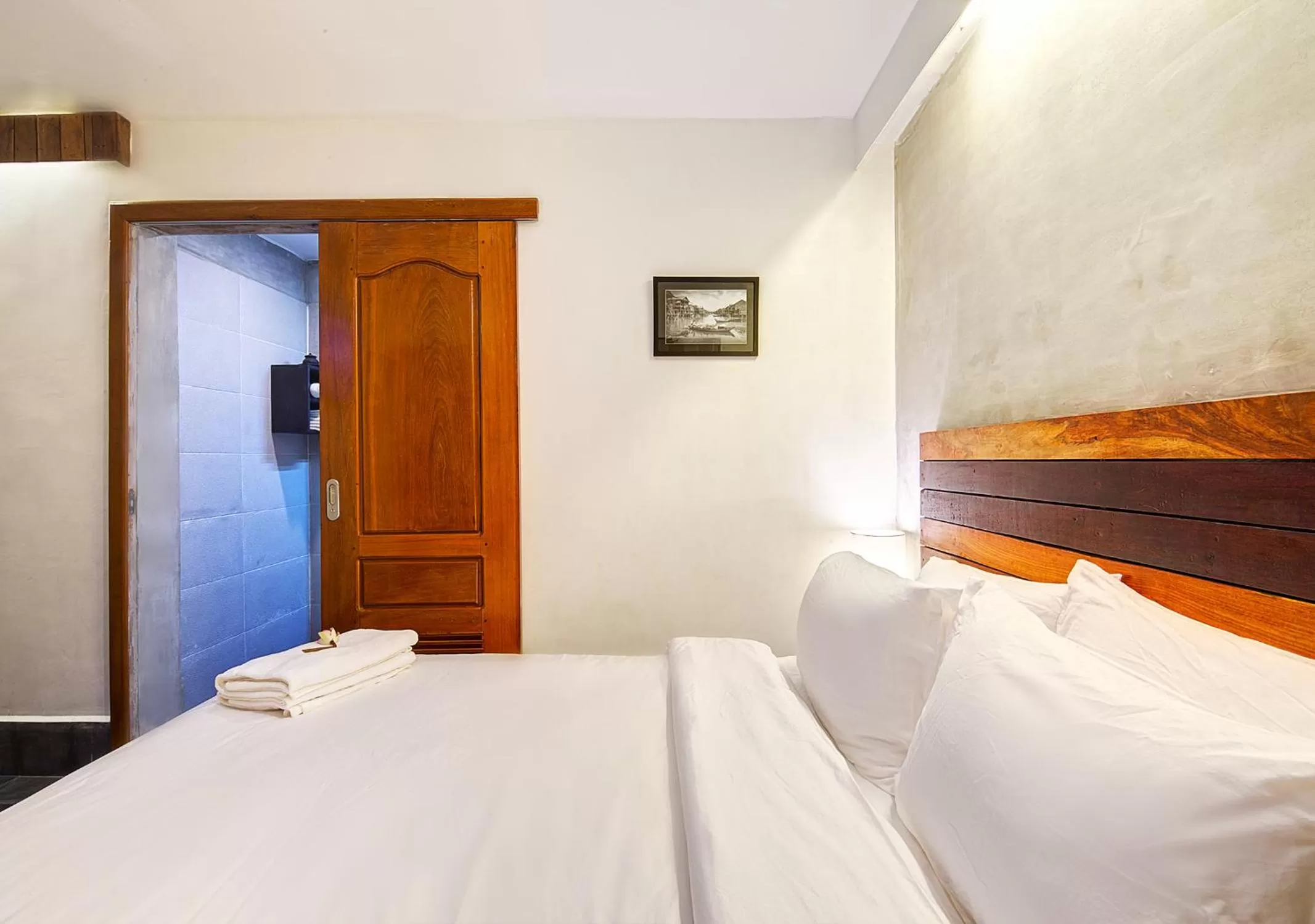 Bed in Maison Model d'Angkor