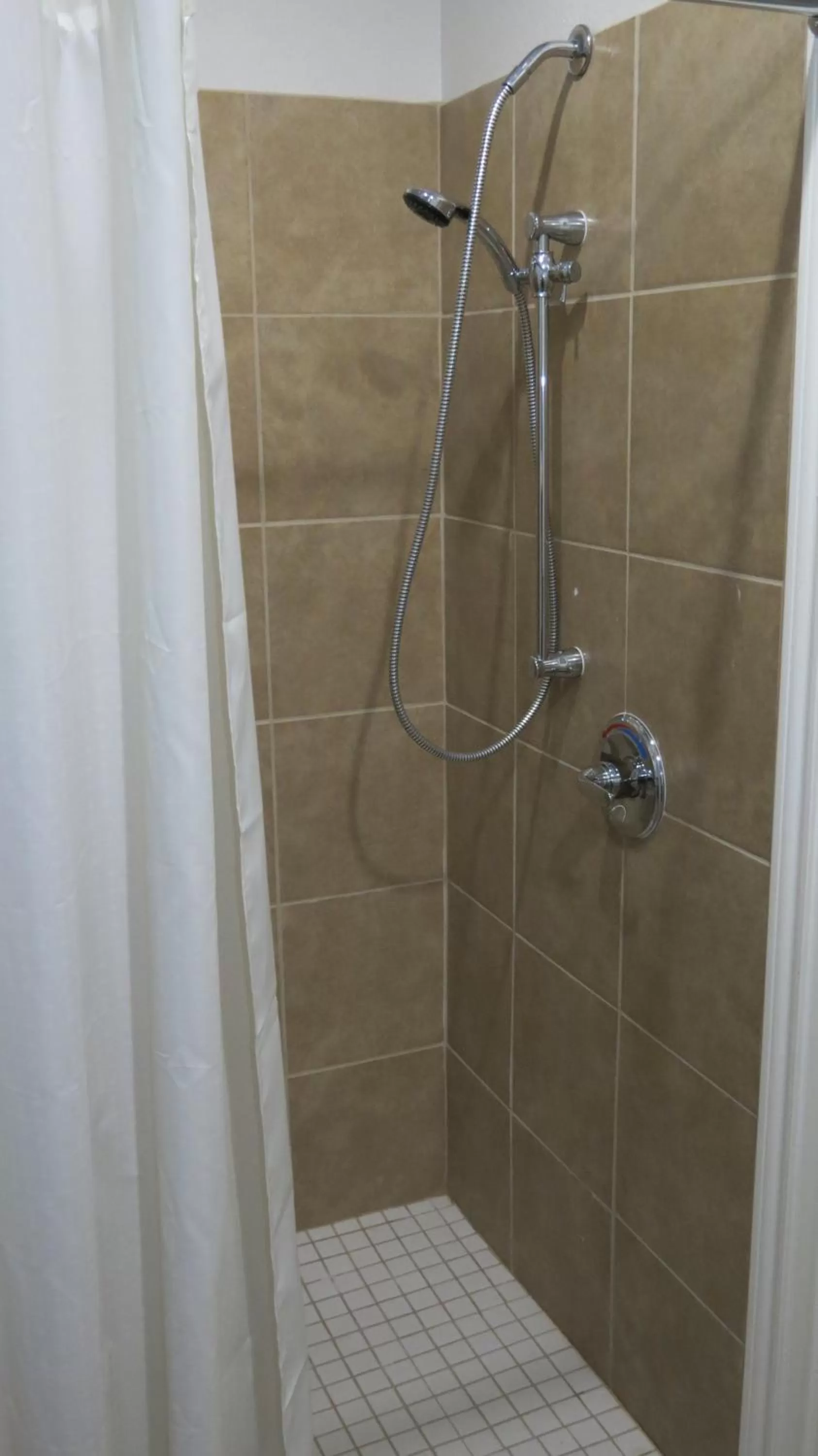 Shower in Super 8 by Wyndham Houston North I-45