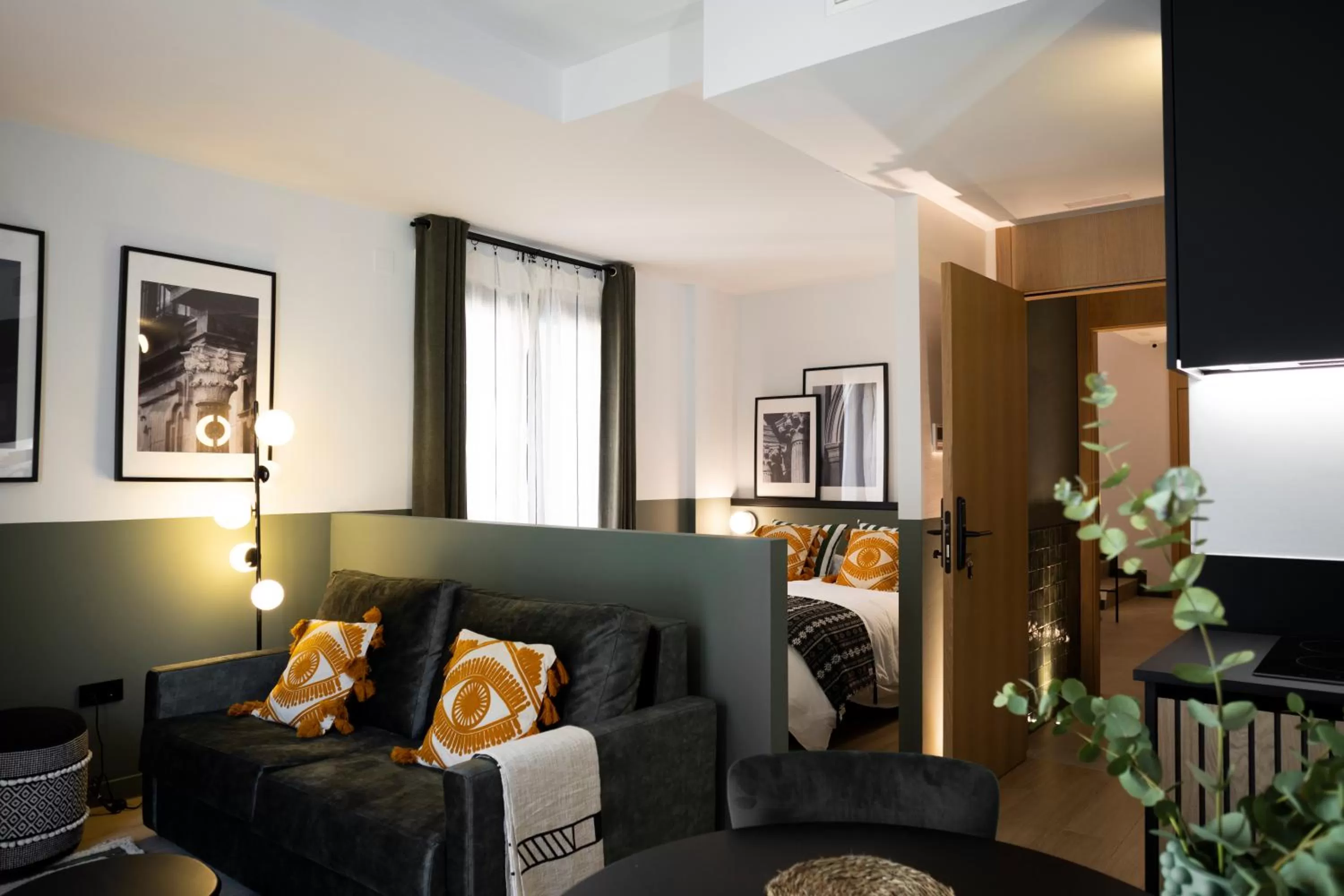 Living room, Bed in Doña Lola Alojamientos Boutique