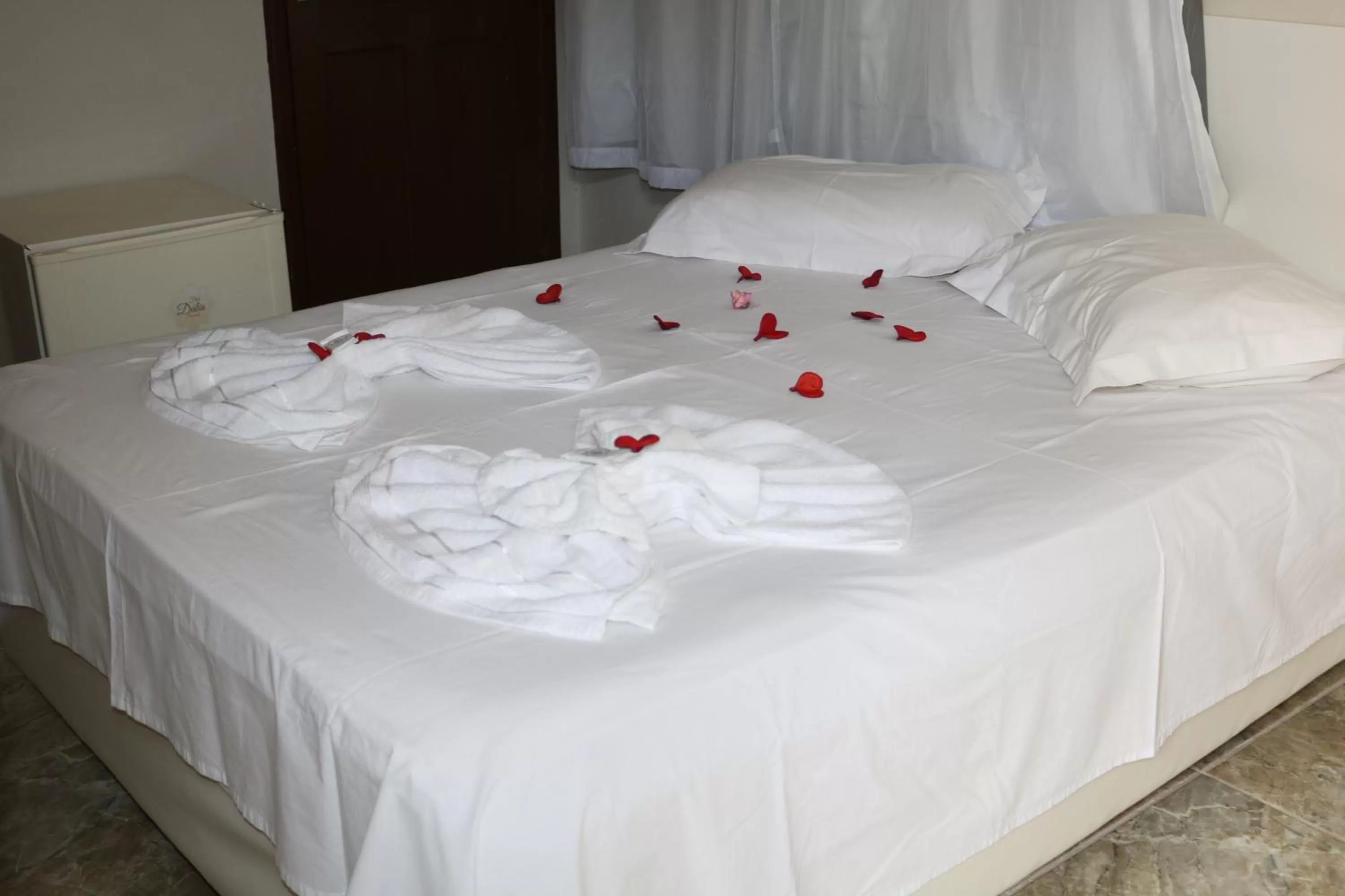 Bed in Pousada Flor Dália