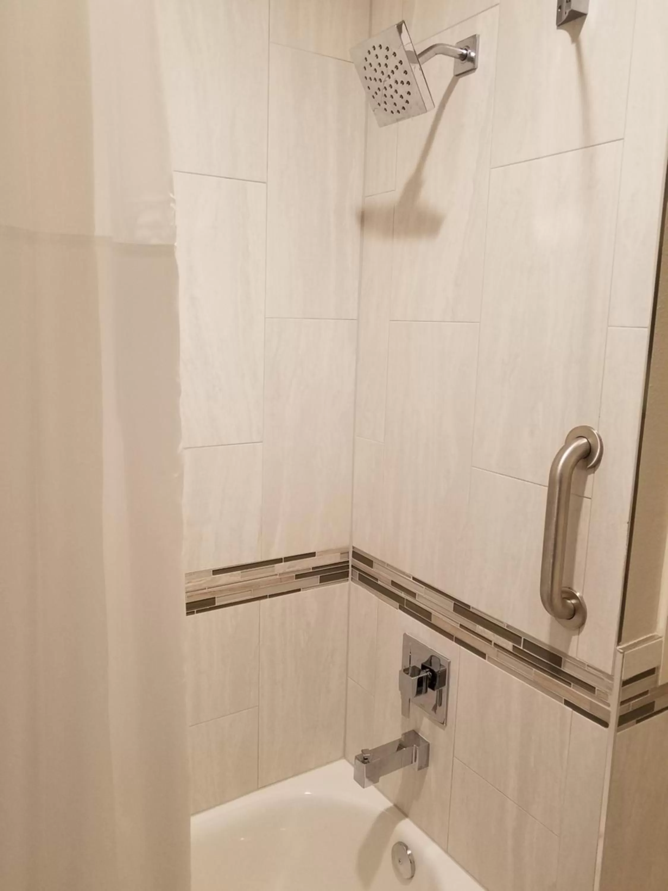 Bathroom in Palace Inn Blue Tomball Parkway