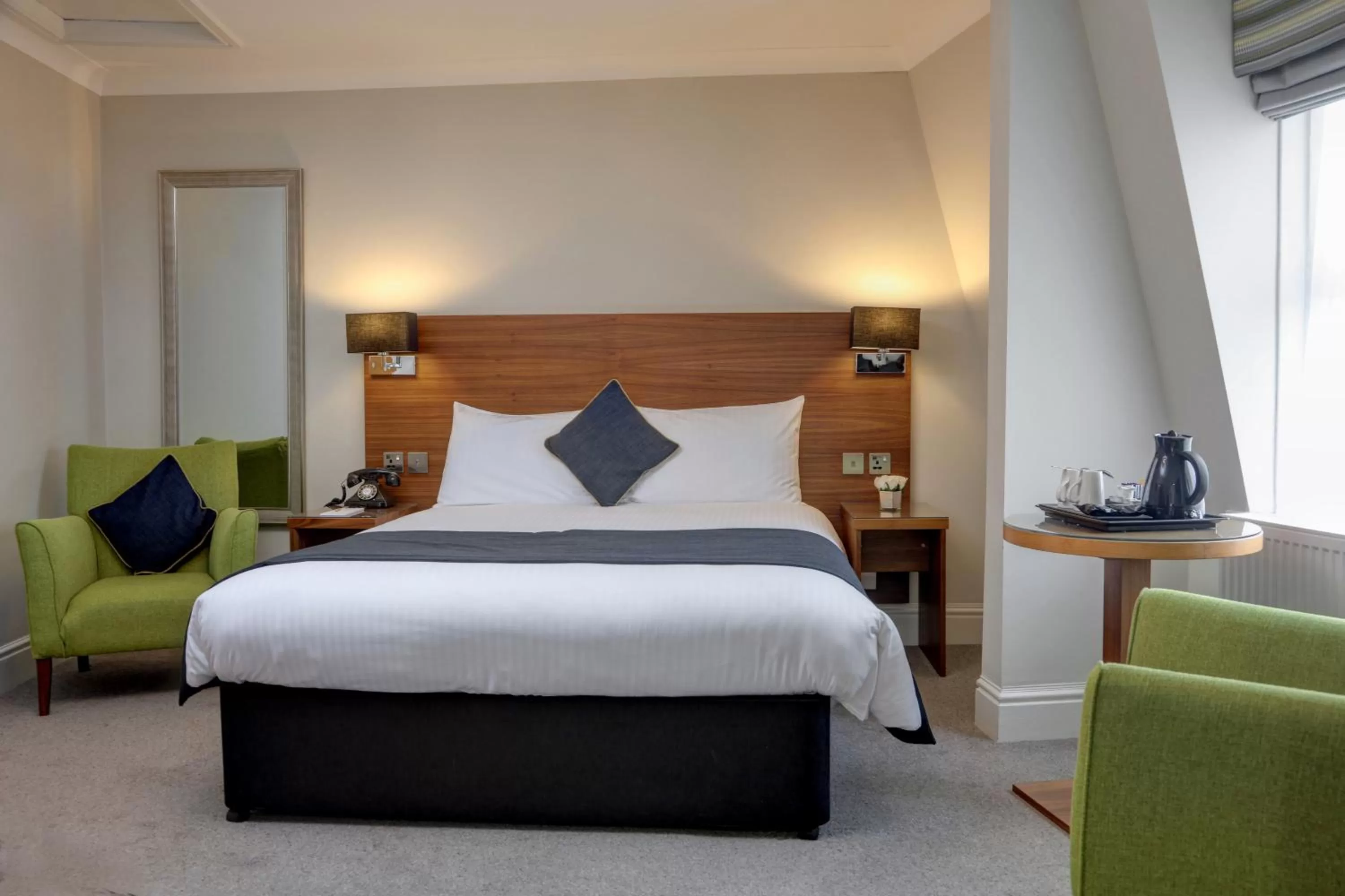 Bed in New Continental Hotel; Sure Hotel Collection by Best Western