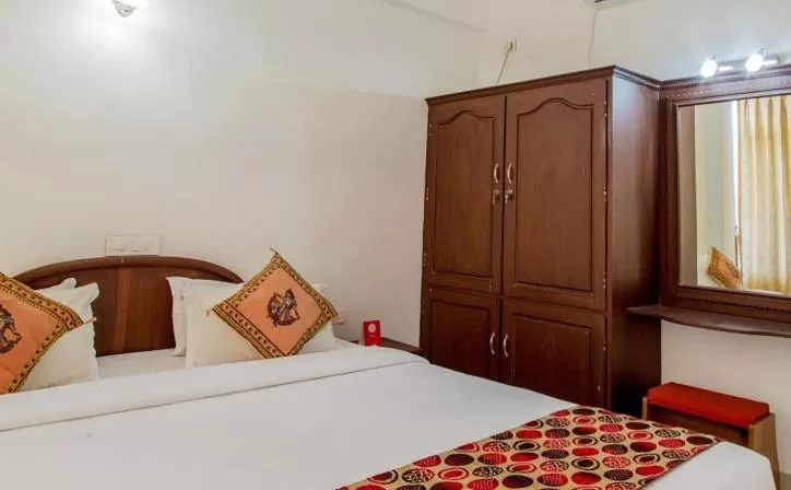 Bed in Swapnatheeram Beach Resort