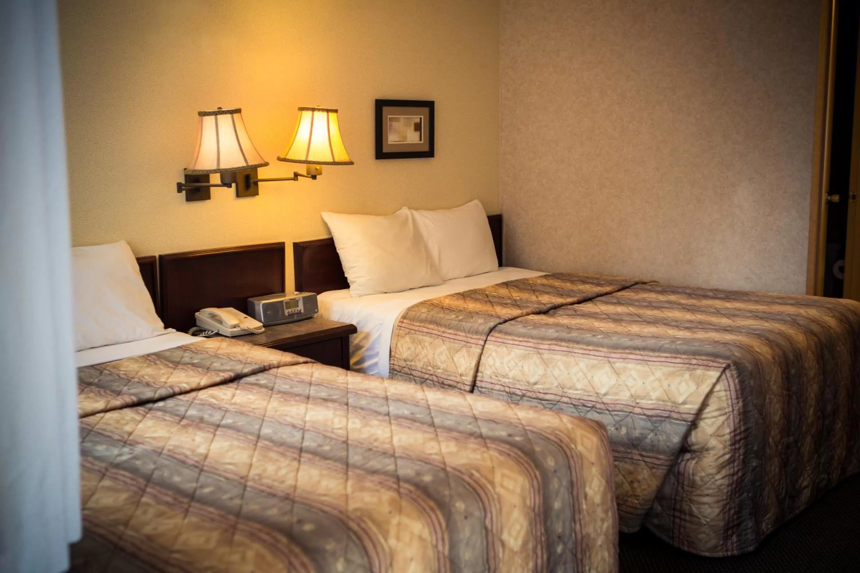 Photo of the whole room, Bed in Langley Hwy Hotel