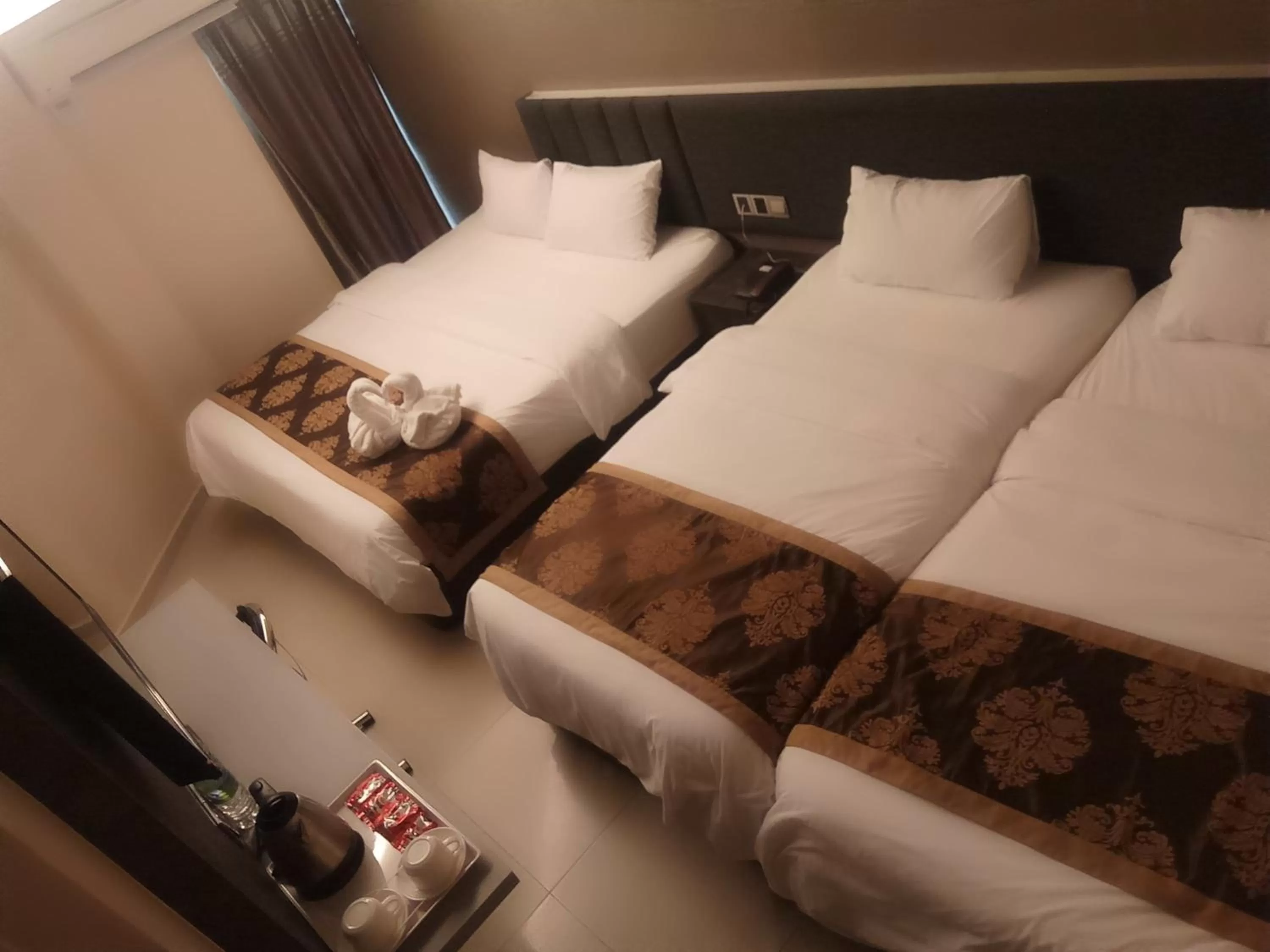 Bed in Golden Leaves Hotel