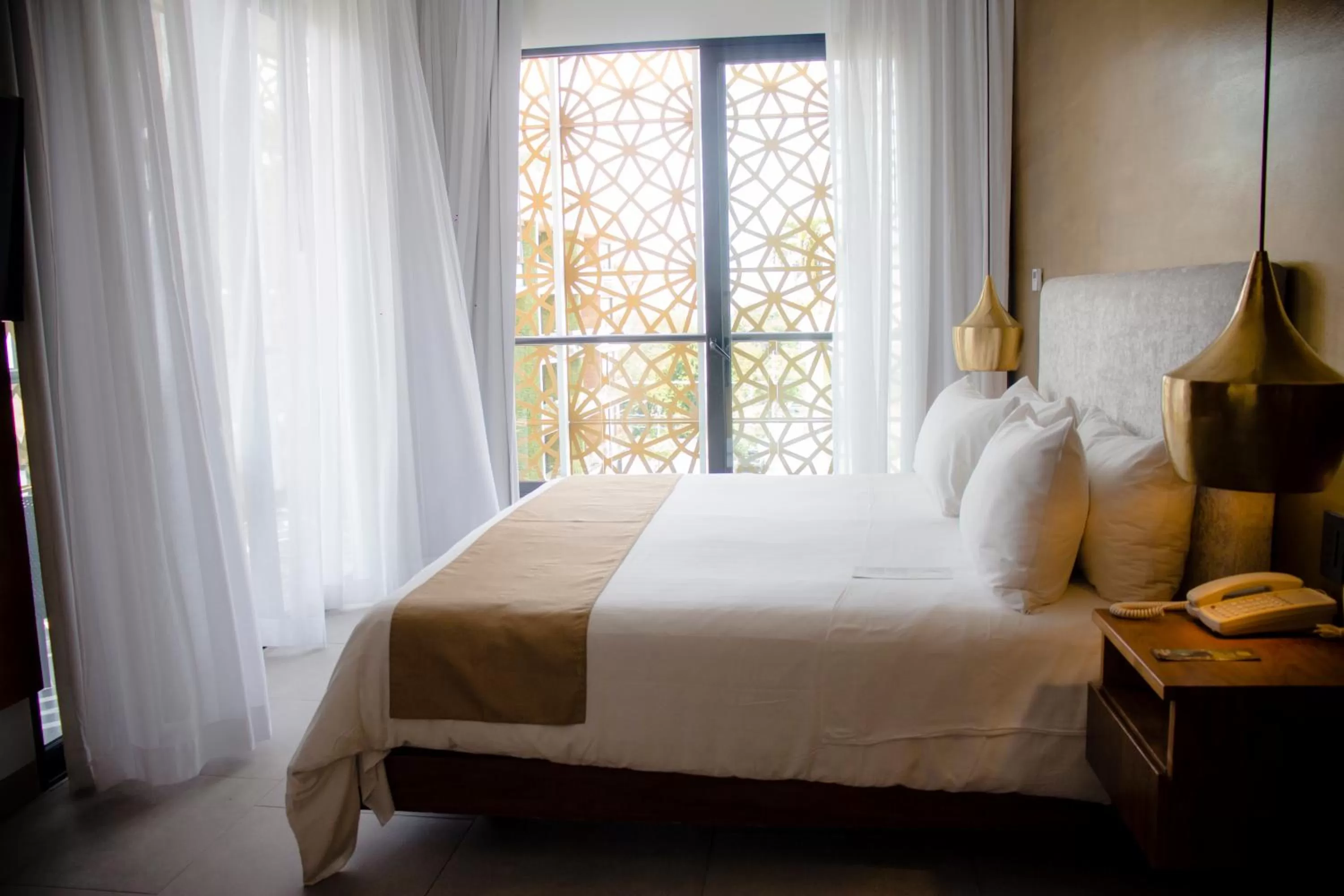 Bed in IT Boutique Hotel & Restaurant