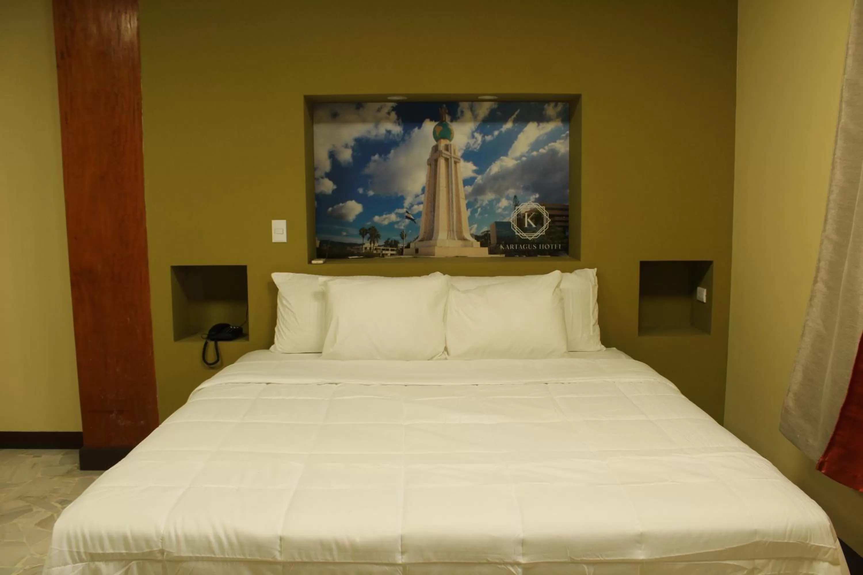 Bed in Kartagus Hotel