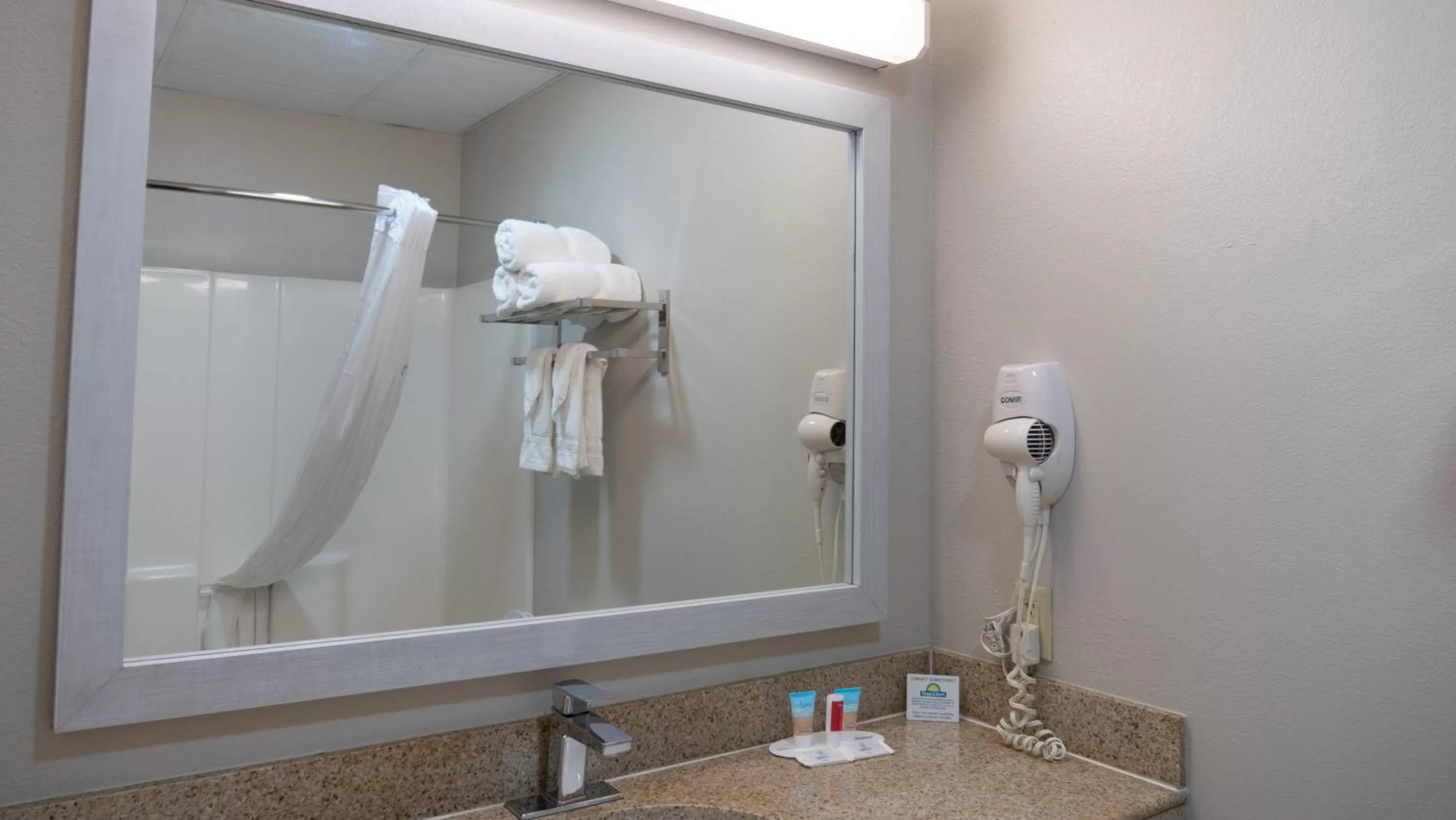 Bathroom in Days Inn & Suites by Wyndham Savannah North I-95