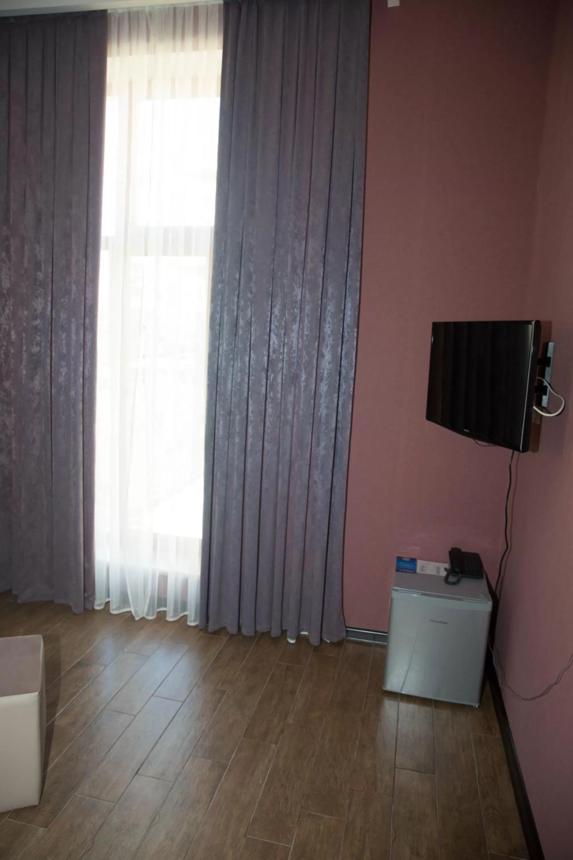 Living room, TV/Entertainment Center in Eridana Hotel