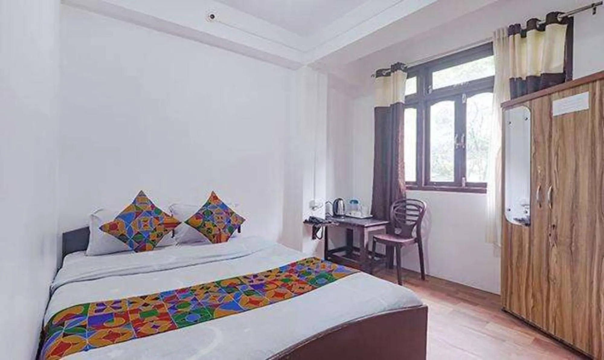 Bed in FabExpress Laxmi Niwas