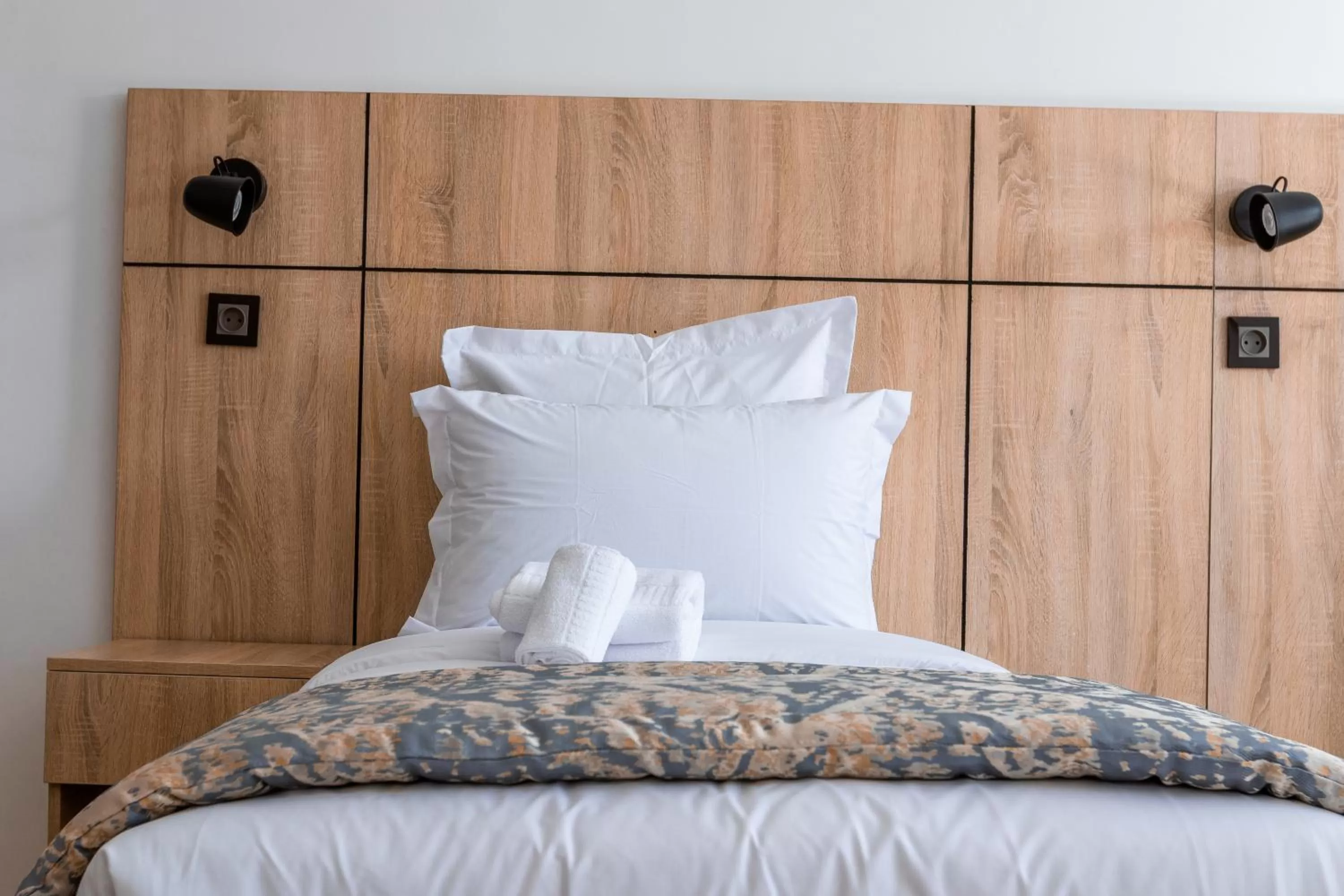 Bed in Karam City Hotel