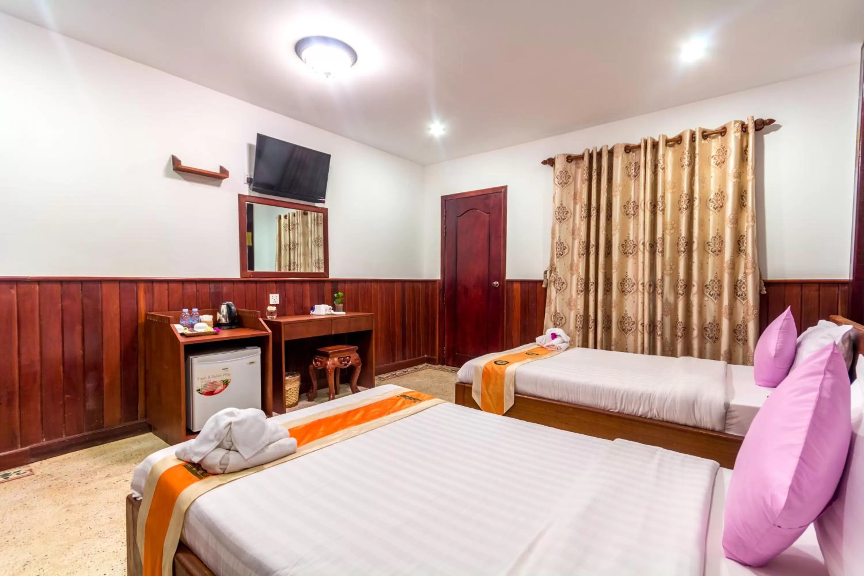 Bed in BayStone Resort