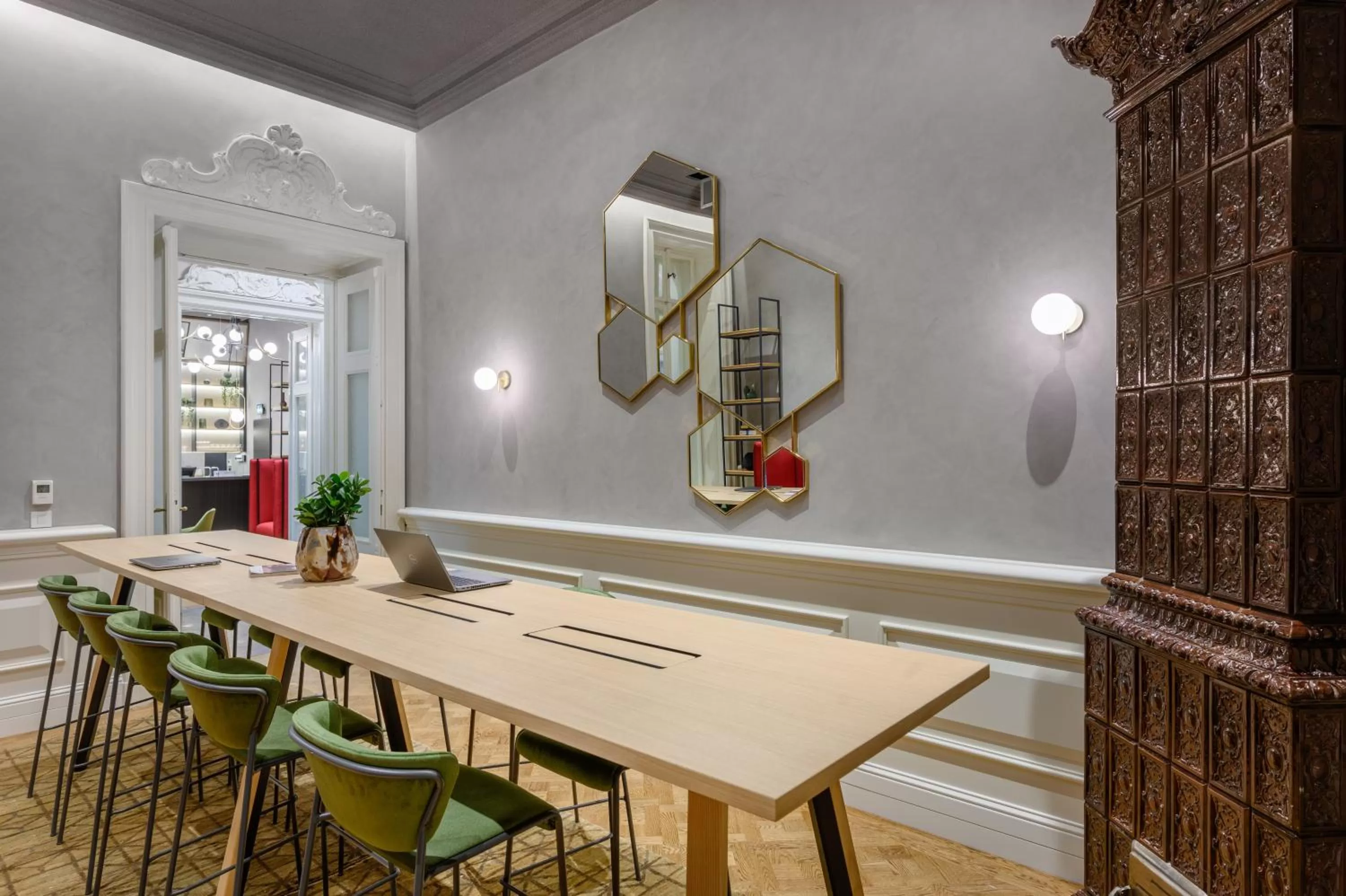 Communal lounge/ TV room in Hotel Oktogon Haggenmacher by Continental Group