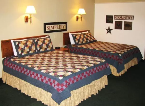 Bed in Covered Wagon Motel Lusk WY