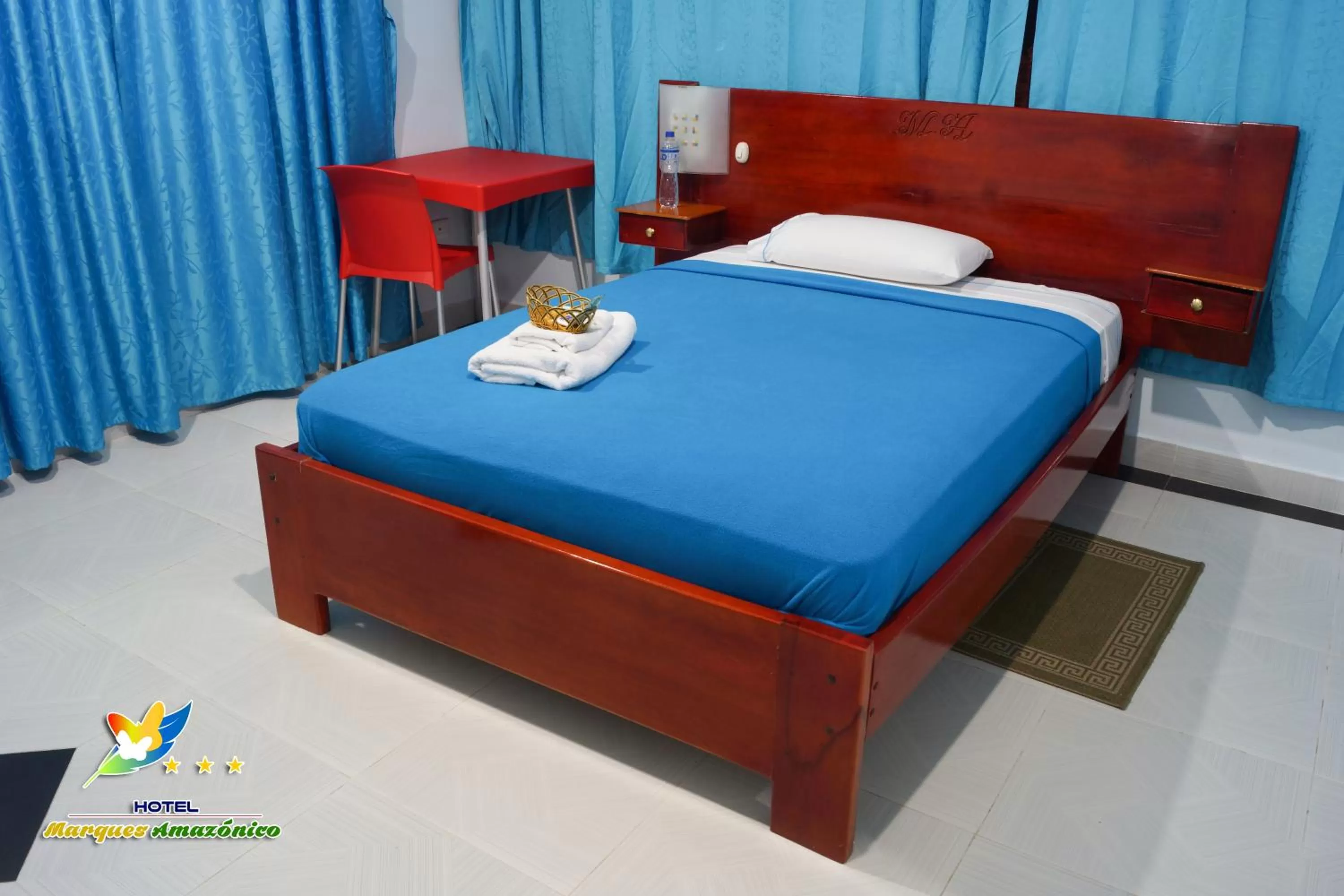 Bed in Hotel Marques Amazonico