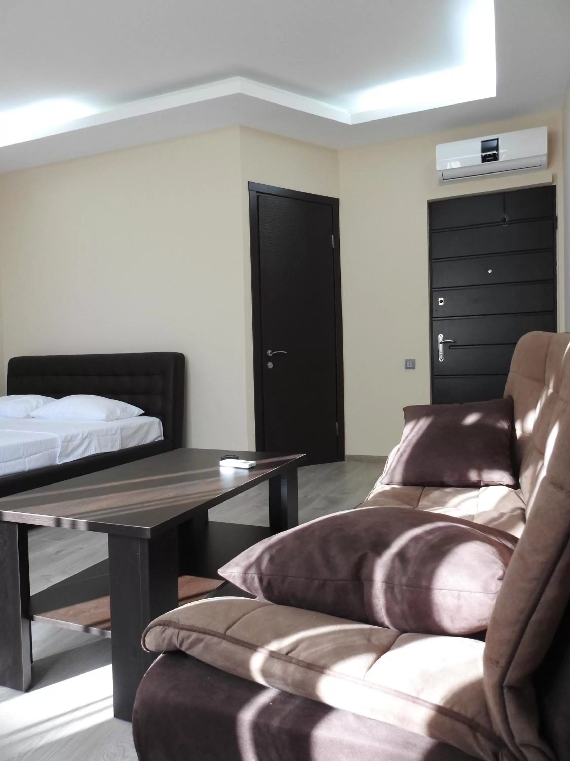 Bed in Iko's Family Apartments