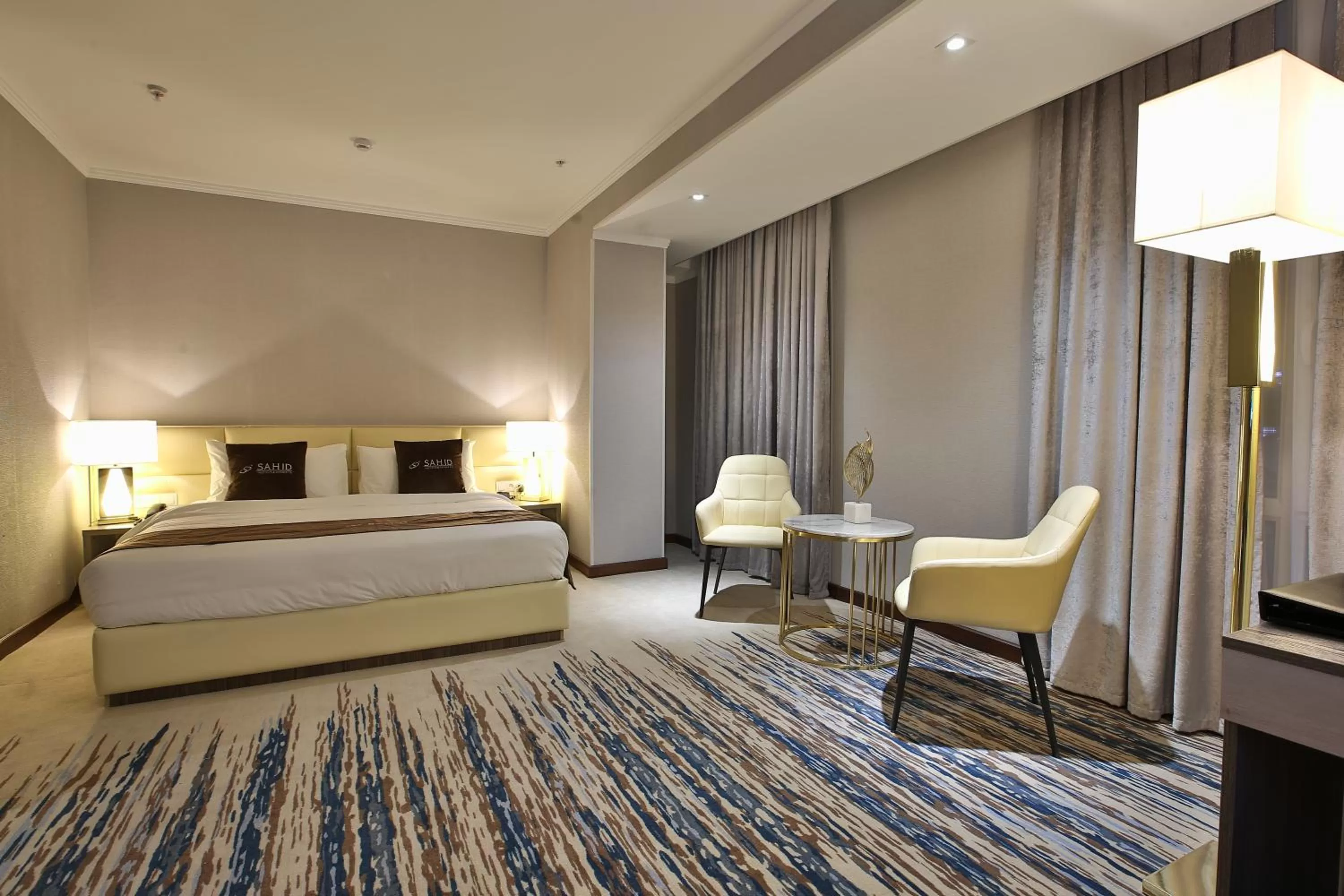 Seating area, Bed in Sahid Zarafshon