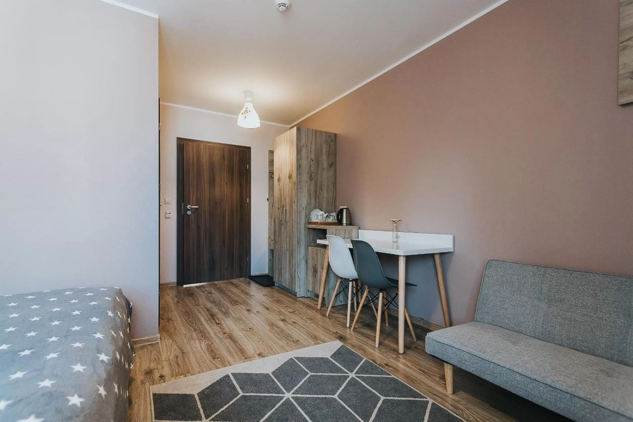 Bed, Seating Area in Hotel Majerzanka