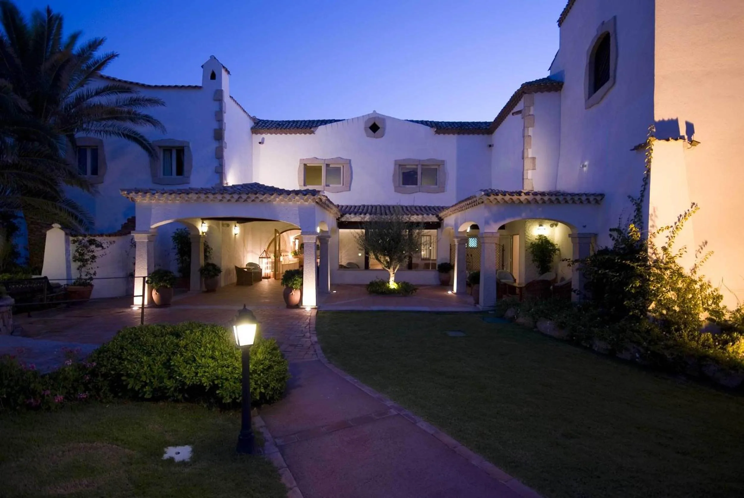 Facade/entrance in COLONNA GRAND HOTEL CAPO TESTA, a Colonna Luxury Beach Hotel, Santa Teresa Sardegna