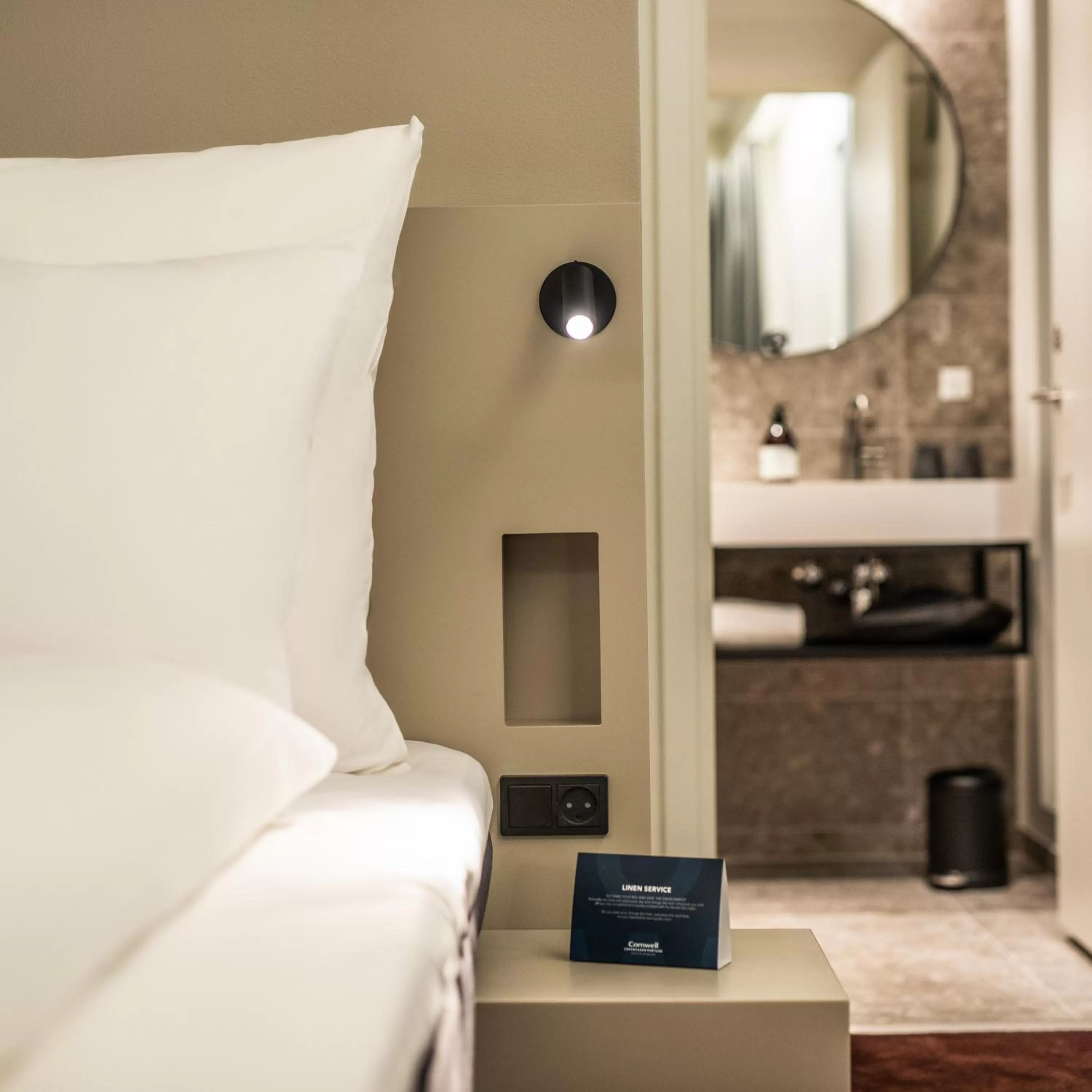 Bathroom, Bed in Comwell Copenhagen Portside Dolce by Wyndham