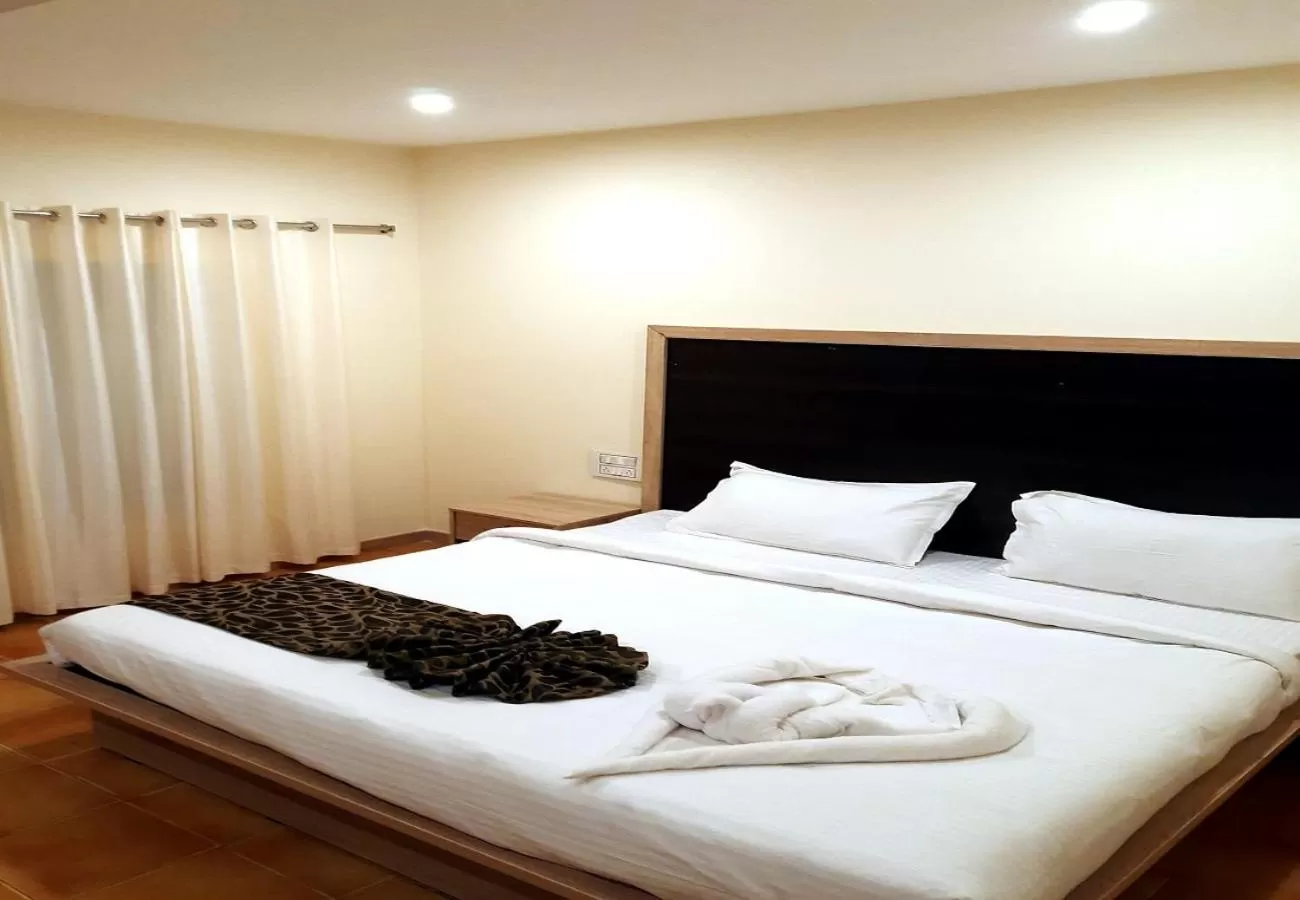 Bed in GRAND KODAI SR INN