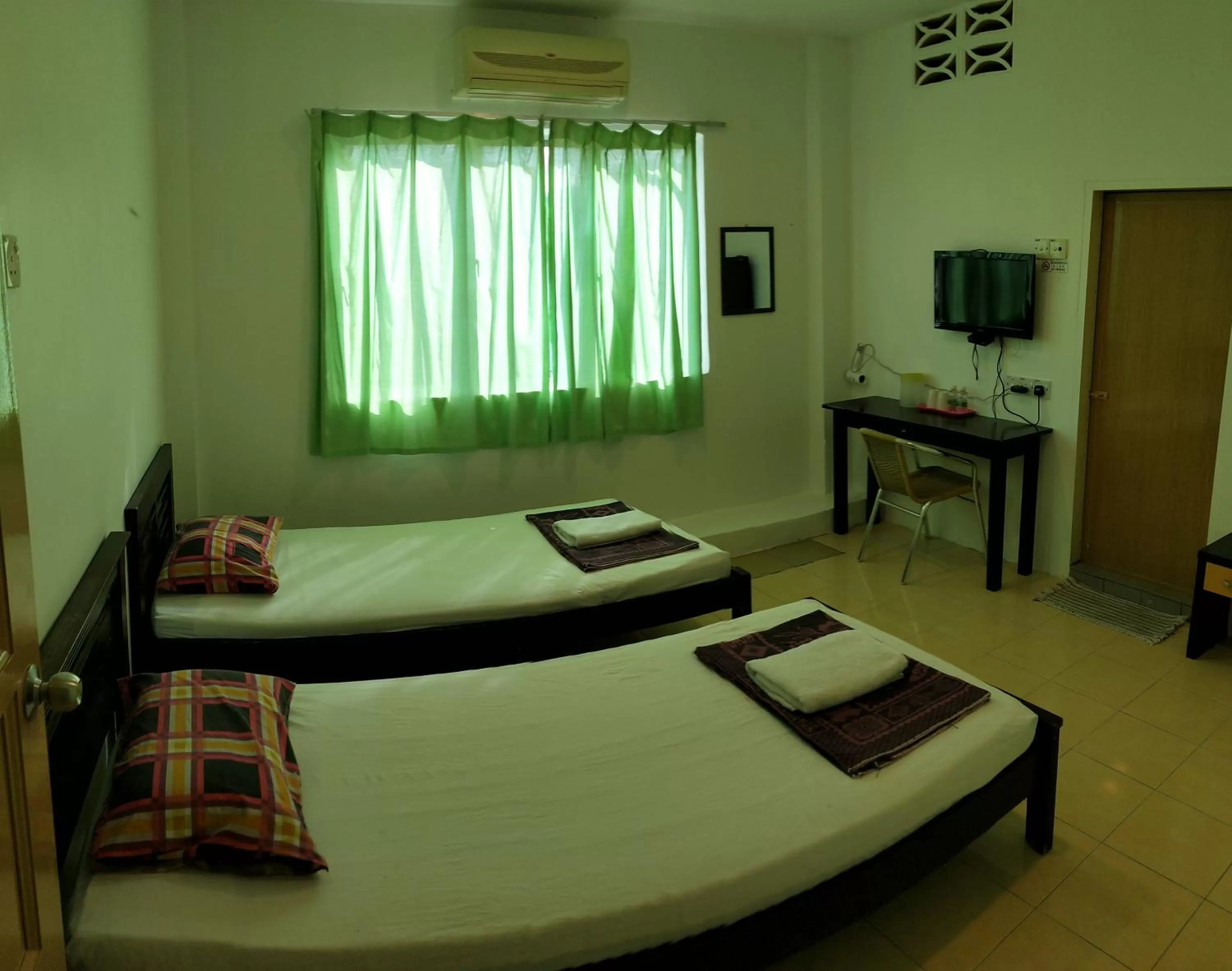 Bed in Hotel Tanjong