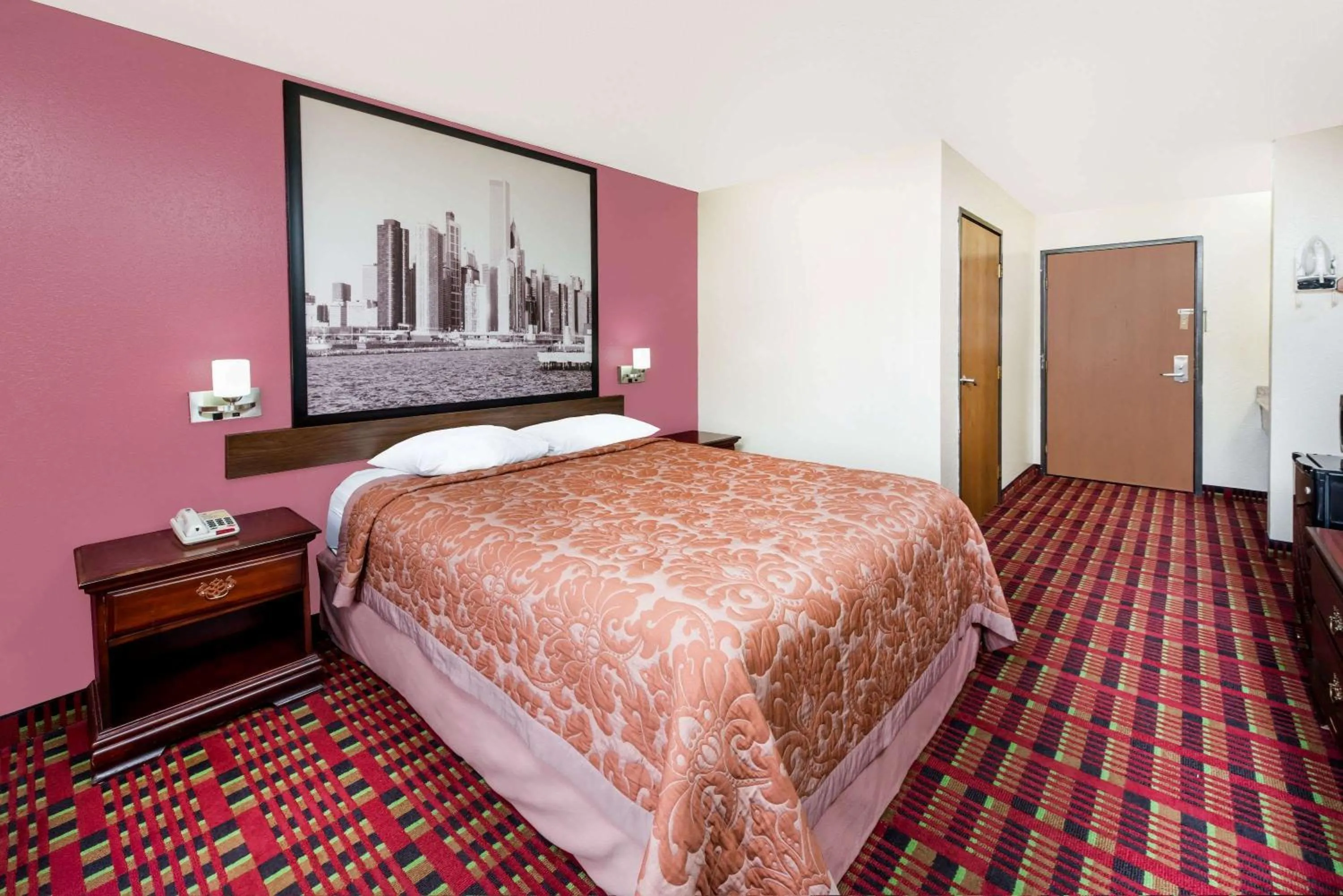 Photo of the whole room, Bed in Super 8 by Wyndham Paris IL