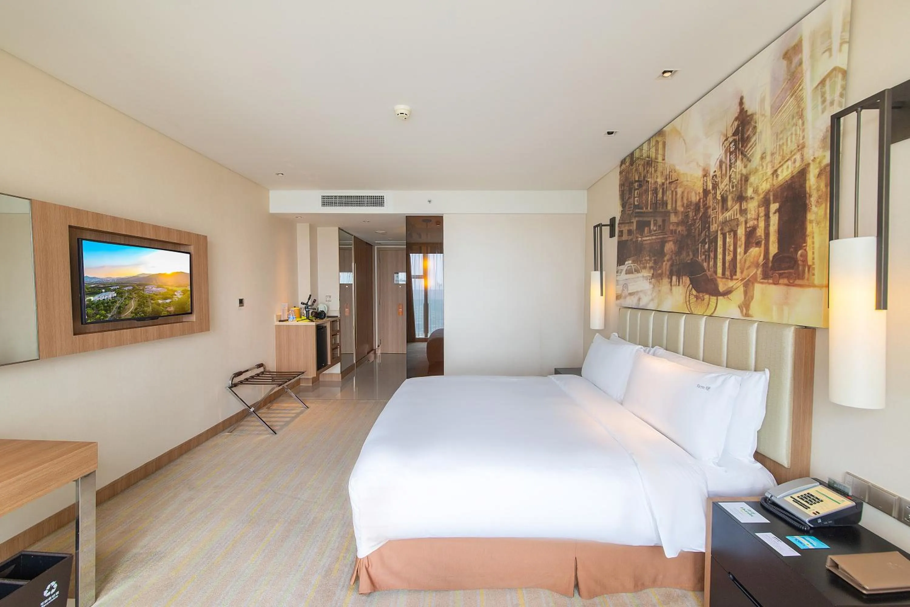 Photo of the whole room, Bed in Junluxe Hotel Guangzhou Science City