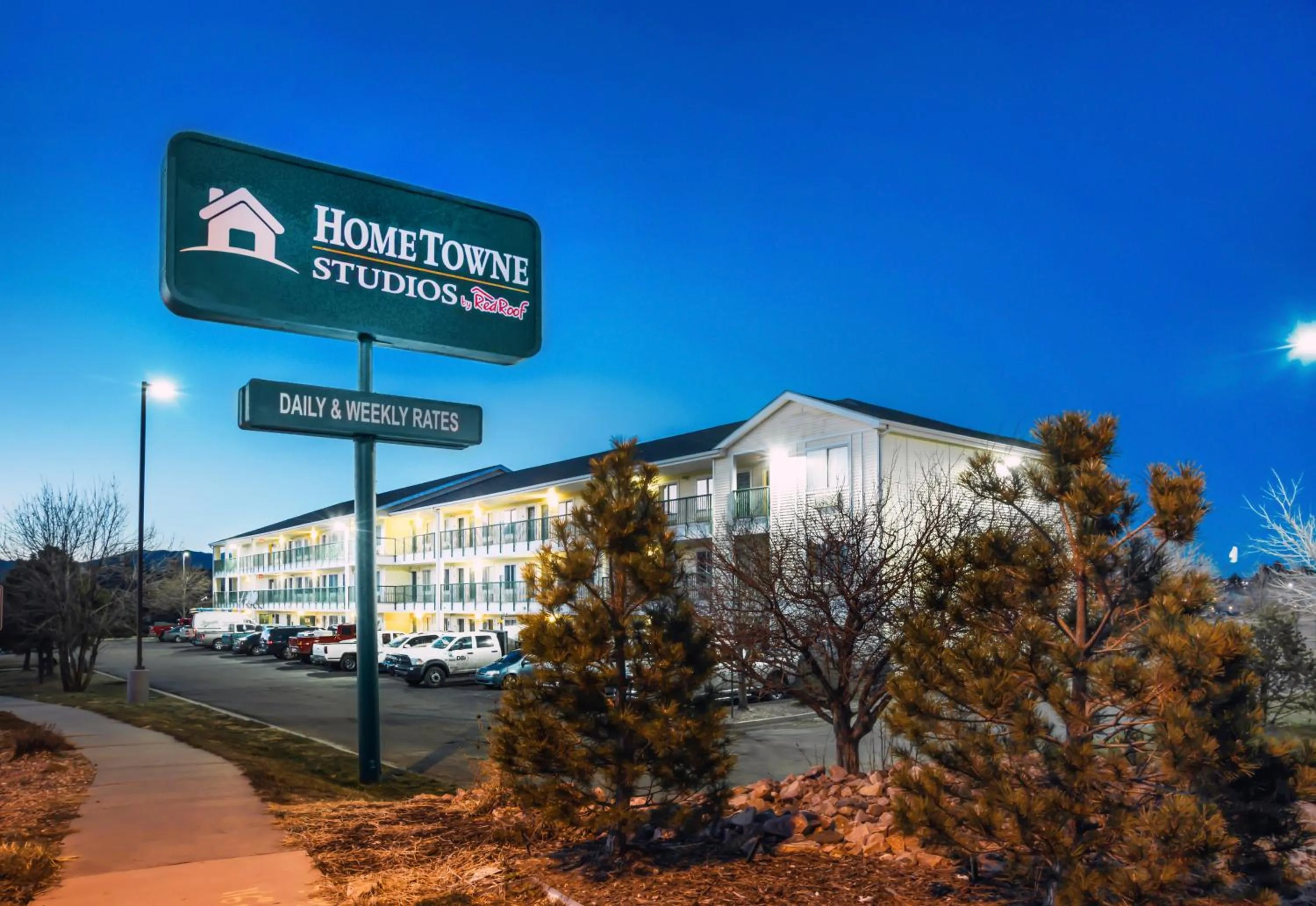 Property building in HomeTowne Studios by Red Roof Colorado Springs - Airport