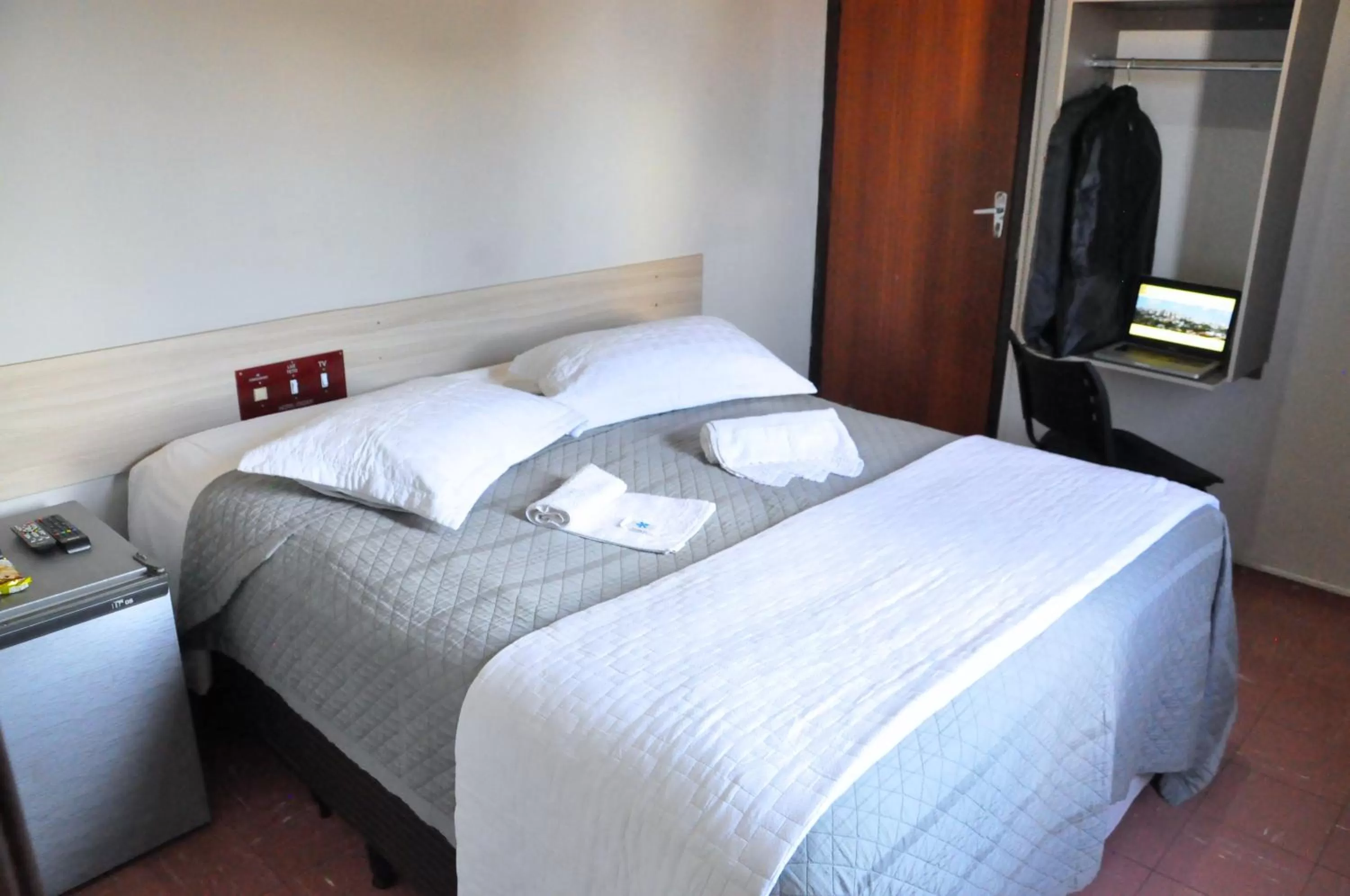 Bed in Hotel Caçula