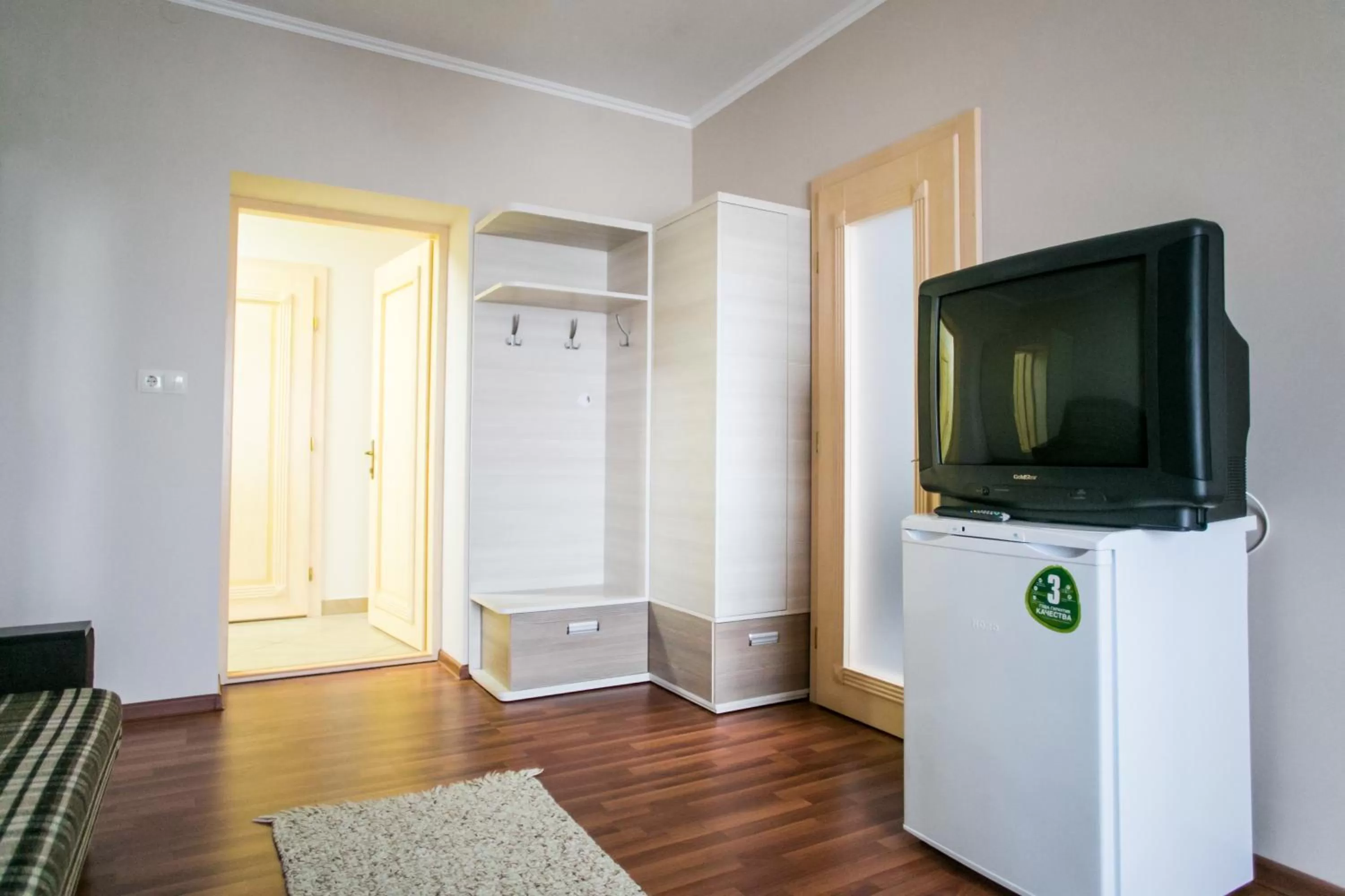 TV/Entertainment Center in Tulipan Hotel Aquapark